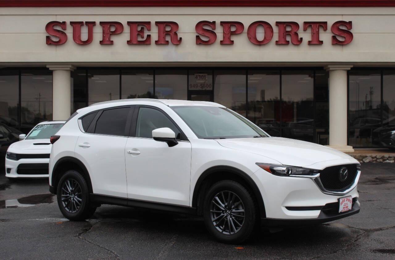 2020 White Mazda CX-5 Touring (JM3KFACM0L0) with an 2.5L L4 DOHC 16V engine, 6A transmission, located at 4301 NW 39th , Oklahoma City, OK, 73112, (405) 949-5600, 35.512135, -97.598671 - NO DRIVERS LICENCE -NO FULL COVERAGE INSURANCE - NO CREDIT CHECK. COME ON OVER TO SUPERSPORTS, TAKE A LOOK AND TEST DRIVE. PLEASE GIVE US A CALL AT (405) 949-5600. NO LICENCIA DE CONDUCIR - NO SEGURO DE COBERTURA TOTAL - NO VERIFICACION DE CREDITO. VISITENOS EN SUPERSPORTS, MIRE NUESTRO - Photo#0