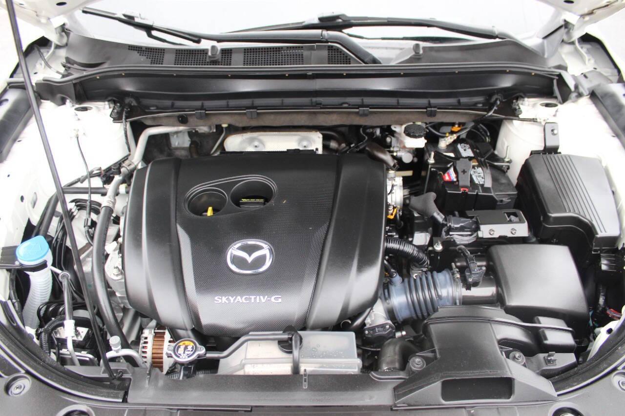 2020 White Mazda CX-5 Touring (JM3KFACM0L0) with an 2.5L L4 DOHC 16V engine, 6A transmission, located at 4301 NW 39th , Oklahoma City, OK, 73112, (405) 949-5600, 35.512135, -97.598671 - NO DRIVERS LICENCE -NO FULL COVERAGE INSURANCE - NO CREDIT CHECK. COME ON OVER TO SUPERSPORTS, TAKE A LOOK AND TEST DRIVE. PLEASE GIVE US A CALL AT (405) 949-5600. NO LICENCIA DE CONDUCIR - NO SEGURO DE COBERTURA TOTAL - NO VERIFICACION DE CREDITO. VISITENOS EN SUPERSPORTS, MIRE NUESTRO - Photo#7