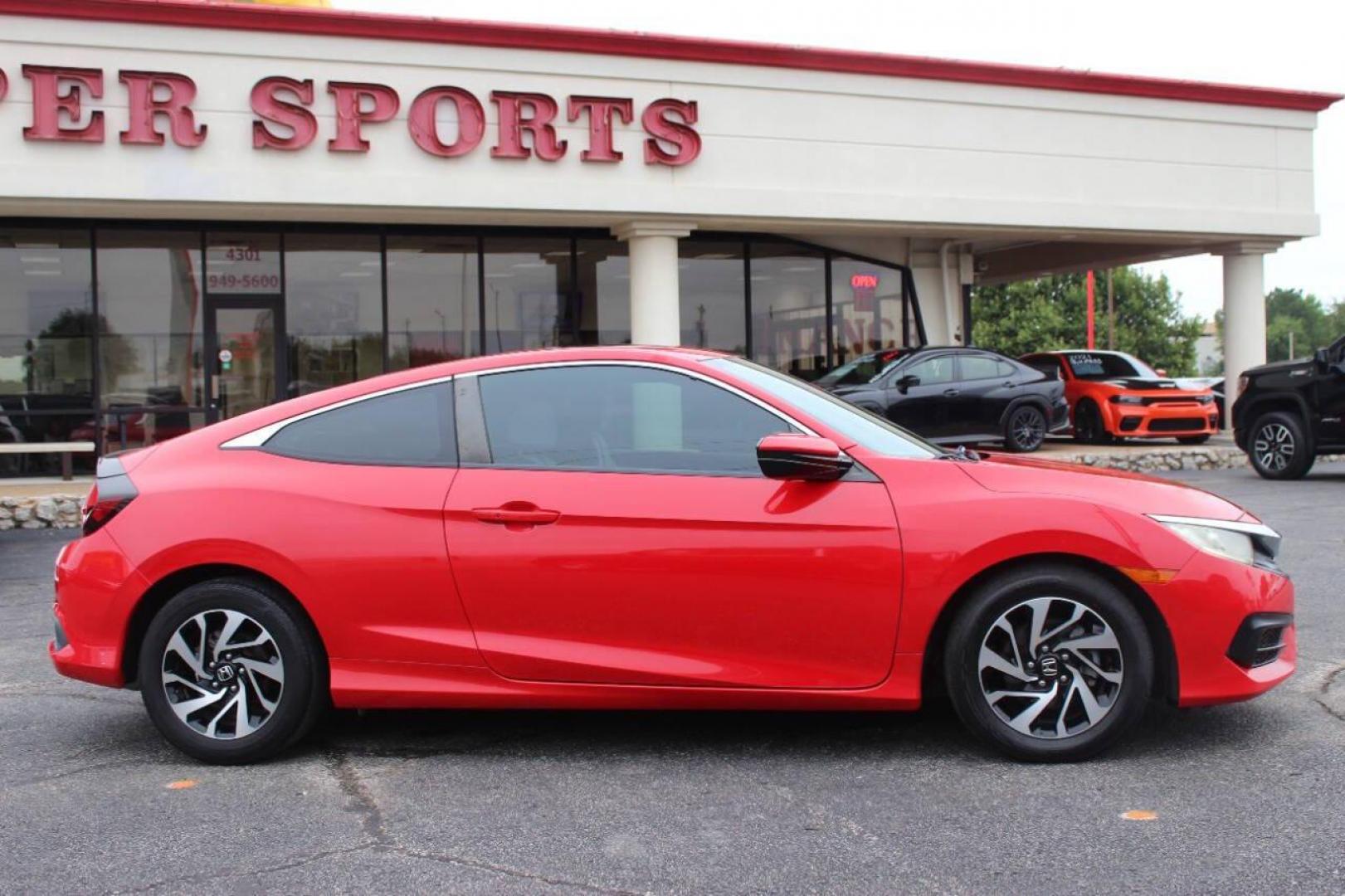 2016 Red Honda Civic LX-P Coupe CVT (2HGFC4B02GH) with an 2.0L L4 DOHC 16V engine, CVT transmission, located at 4301 NW 39th , Oklahoma City, OK, 73112, (405) 949-5600, 35.512135, -97.598671 - NO DRIVERS LICENCE -NO FULL COVERAGE INSURANCE - NO CREDIT CHECK. COME ON OVER TO SUPERSPORTS, TAKE A LOOK AND TEST DRIVE. PLEASE GIVE US A CALL AT (405) 949-5600. NO LICENCIA DE CONDUCIR - NO SEGURO DE COBERTURA TOTAL - NO VERIFICACION DE CREDITO. VISITENOS EN SUPERSPORTS, MIRE NUESTRO - Photo#3