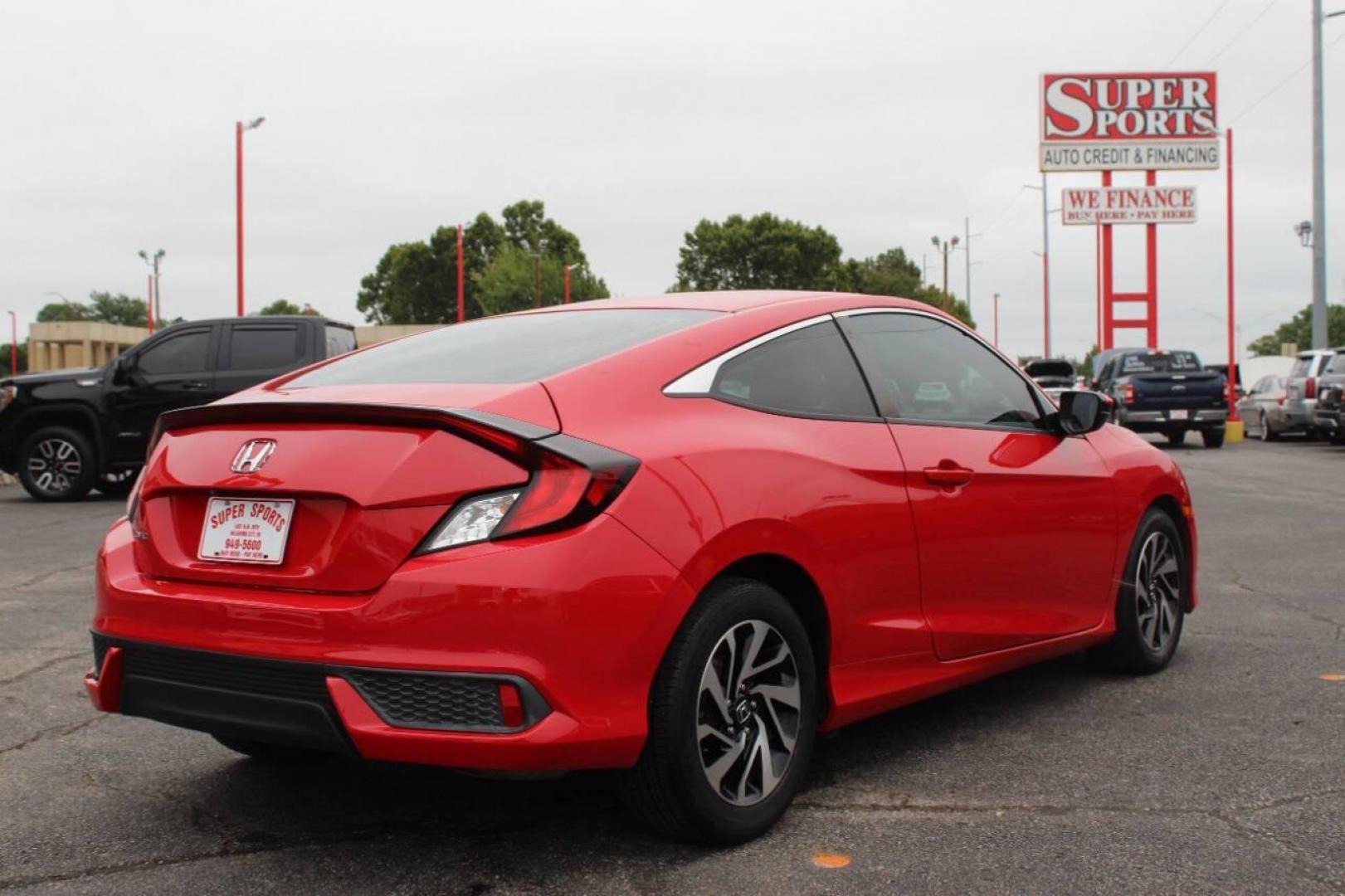 2016 Red Honda Civic LX-P Coupe CVT (2HGFC4B02GH) with an 2.0L L4 DOHC 16V engine, CVT transmission, located at 4301 NW 39th , Oklahoma City, OK, 73112, (405) 949-5600, 35.512135, -97.598671 - NO DRIVERS LICENCE -NO FULL COVERAGE INSURANCE - NO CREDIT CHECK. COME ON OVER TO SUPERSPORTS, TAKE A LOOK AND TEST DRIVE. PLEASE GIVE US A CALL AT (405) 949-5600. NO LICENCIA DE CONDUCIR - NO SEGURO DE COBERTURA TOTAL - NO VERIFICACION DE CREDITO. VISITENOS EN SUPERSPORTS, MIRE NUESTRO - Photo#4