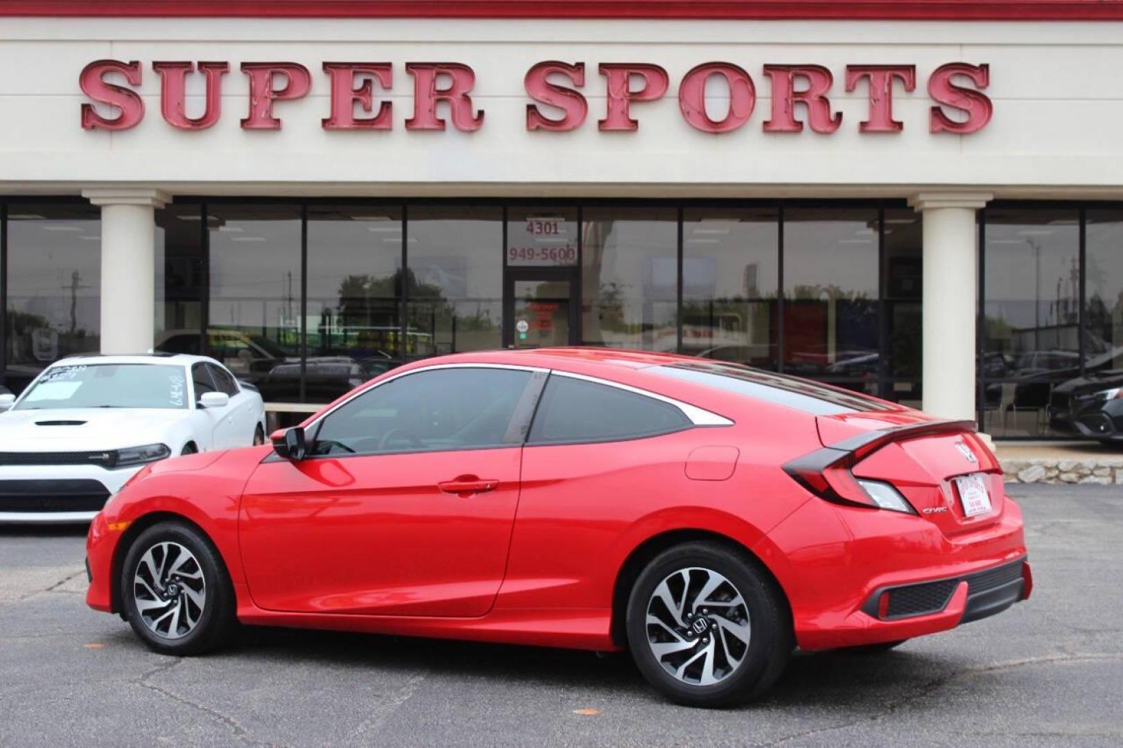 2016 Red Honda Civic LX-P Coupe CVT (2HGFC4B02GH) with an 2.0L L4 DOHC 16V engine, CVT transmission, located at 4301 NW 39th , Oklahoma City, OK, 73112, (405) 949-5600, 35.512135, -97.598671 - NO DRIVERS LICENCE -NO FULL COVERAGE INSURANCE - NO CREDIT CHECK. COME ON OVER TO SUPERSPORTS, TAKE A LOOK AND TEST DRIVE. PLEASE GIVE US A CALL AT (405) 949-5600. NO LICENCIA DE CONDUCIR - NO SEGURO DE COBERTURA TOTAL - NO VERIFICACION DE CREDITO. VISITENOS EN SUPERSPORTS, MIRE NUESTRO - Photo#5