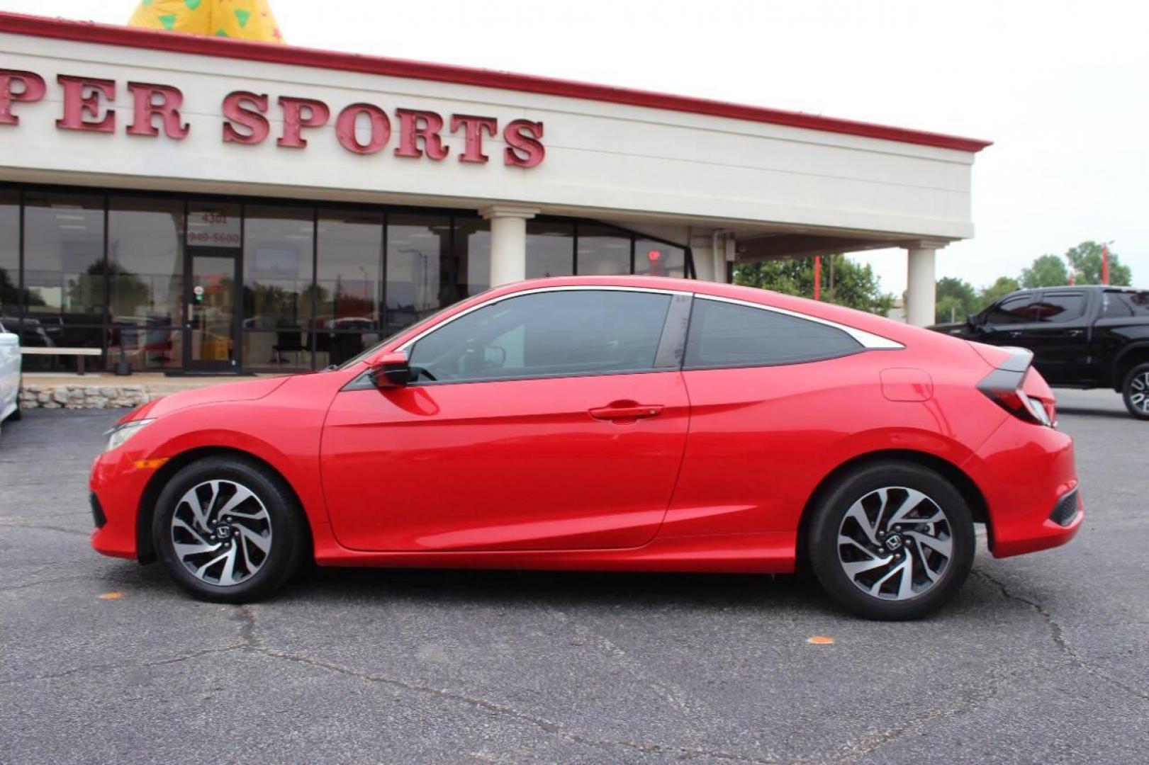 2016 Red Honda Civic LX-P Coupe CVT (2HGFC4B02GH) with an 2.0L L4 DOHC 16V engine, CVT transmission, located at 4301 NW 39th , Oklahoma City, OK, 73112, (405) 949-5600, 35.512135, -97.598671 - NO DRIVERS LICENCE -NO FULL COVERAGE INSURANCE - NO CREDIT CHECK. COME ON OVER TO SUPERSPORTS, TAKE A LOOK AND TEST DRIVE. PLEASE GIVE US A CALL AT (405) 949-5600. NO LICENCIA DE CONDUCIR - NO SEGURO DE COBERTURA TOTAL - NO VERIFICACION DE CREDITO. VISITENOS EN SUPERSPORTS, MIRE NUESTRO - Photo#6