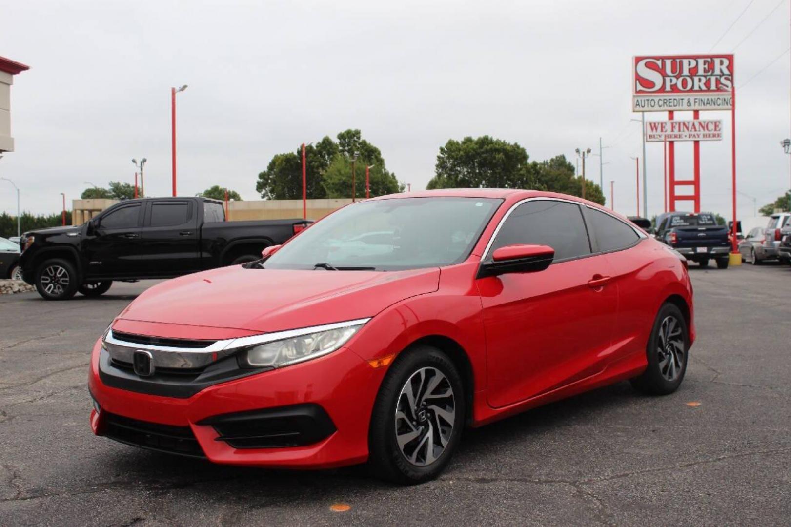 2016 Red Honda Civic LX-P Coupe CVT (2HGFC4B02GH) with an 2.0L L4 DOHC 16V engine, CVT transmission, located at 4301 NW 39th , Oklahoma City, OK, 73112, (405) 949-5600, 35.512135, -97.598671 - NO DRIVERS LICENCE -NO FULL COVERAGE INSURANCE - NO CREDIT CHECK. COME ON OVER TO SUPERSPORTS, TAKE A LOOK AND TEST DRIVE. PLEASE GIVE US A CALL AT (405) 949-5600. NO LICENCIA DE CONDUCIR - NO SEGURO DE COBERTURA TOTAL - NO VERIFICACION DE CREDITO. VISITENOS EN SUPERSPORTS, MIRE NUESTRO - Photo#7