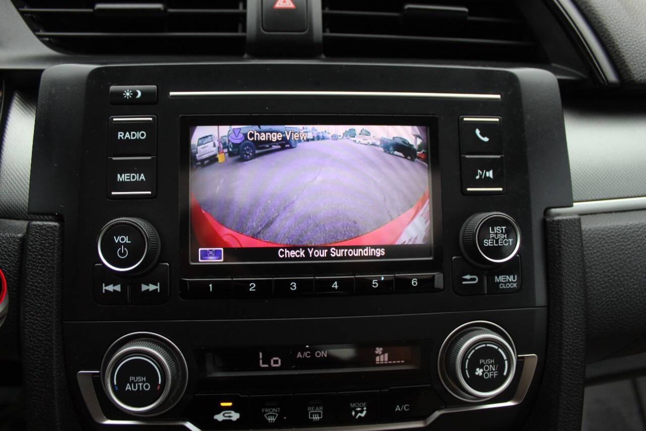 2016 Red Honda Civic LX-P Coupe CVT (2HGFC4B02GH) with an 2.0L L4 DOHC 16V engine, CVT transmission, located at 4301 NW 39th , Oklahoma City, OK, 73112, (405) 949-5600, 35.512135, -97.598671 - NO DRIVERS LICENCE -NO FULL COVERAGE INSURANCE - NO CREDIT CHECK. COME ON OVER TO SUPERSPORTS, TAKE A LOOK AND TEST DRIVE. PLEASE GIVE US A CALL AT (405) 949-5600. NO LICENCIA DE CONDUCIR - NO SEGURO DE COBERTURA TOTAL - NO VERIFICACION DE CREDITO. VISITENOS EN SUPERSPORTS, MIRE NUESTRO - Photo#16