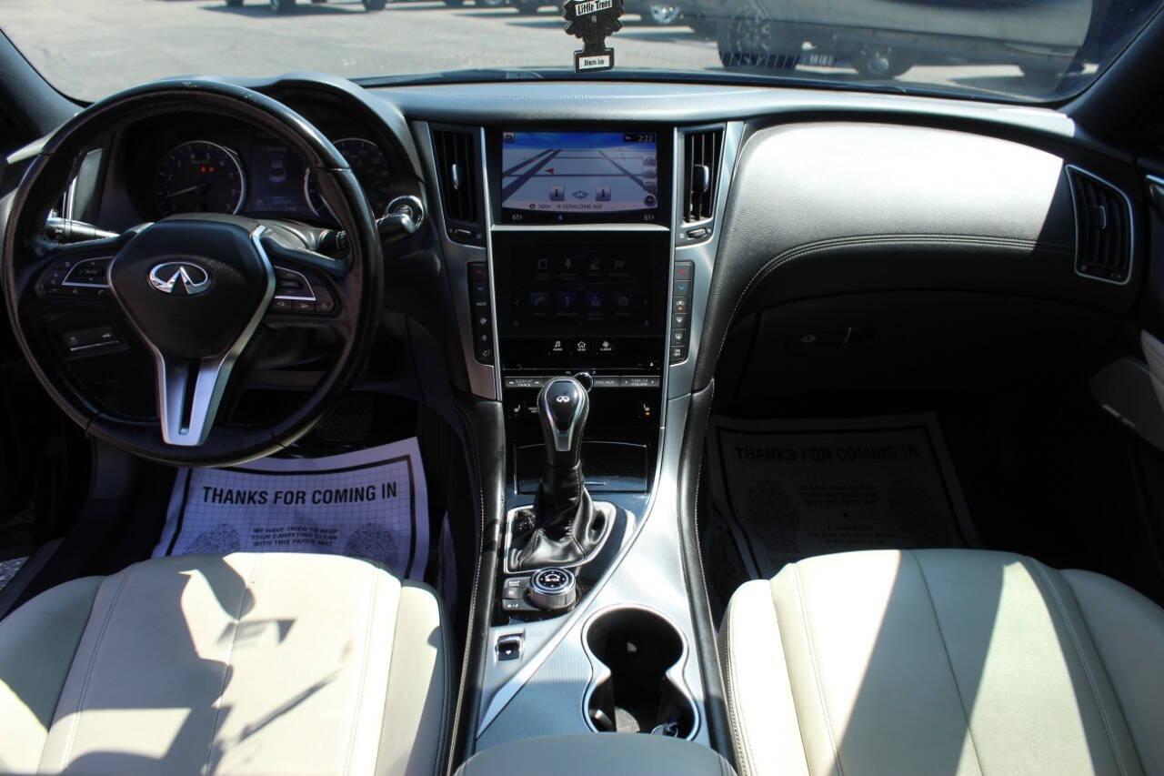 2018 Black Infiniti Q60 3.0t Sport (JN1EV7EK2JM) with an 3.0L V6 DOHC 24V TURBO engine, 7A transmission, located at 4301 NW 39th , Oklahoma City, OK, 73112, (405) 949-5600, 35.512135, -97.598671 - NO DRIVERS LICENCE -NO FULL COVERAGE INSURANCE - NO CREDIT CHECK. COME ON OVER TO SUPERSPORTS, TAKE A LOOK AND TEST DRIVE. PLEASE GIVE US A CALL AT (405) 949-5600. NO LICENCIA DE CONDUCIR - NO SEGURO DE COBERTURA TOTAL - NO VERIFICACION DE CREDITO. VISITENOS EN SUPERSPORTS, MIRE NUESTRO - Photo#15