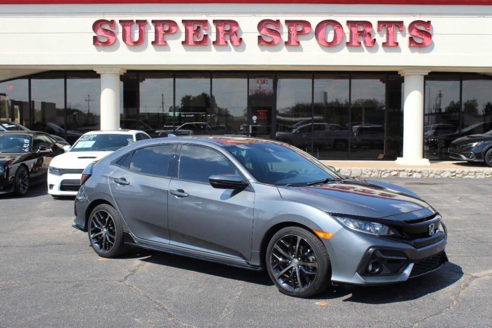 2021 Gray Honda Civic Sport Hatchback CVT (SHHFK7H41MU) with an 2.0L L4 DOHC 16V TURBO engine, CVT transmission, located at 4301 NW 39th , Oklahoma City, OK, 73112, (405) 949-5600, 35.512135, -97.598671 - NO DRIVERS LICENCE NO-FULL COVERAGE INSURANCE-NO CREDIT CHECK. COME ON OVER TO SUPERSPORTS AND TAKE A LOOK AND TEST DRIVE. PLEASE GIVE US A CALL AT (405) 949-5600. NO LICENSIA DE MANEJAR- NO SEGURO DE COBERTURA TOTAL- NO VERIFICACCION DE CREDITO. POR FAVOR VENGAN A SUPERSPORTS, ECHE UN - Photo#0