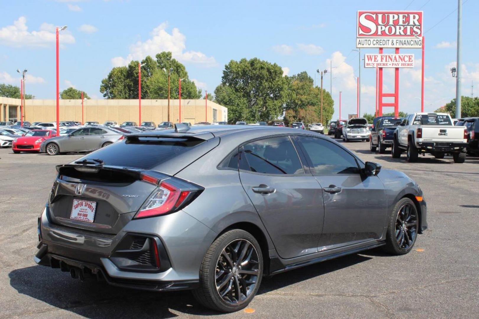 2021 Gray Honda Civic Sport Hatchback CVT (SHHFK7H41MU) with an 2.0L L4 DOHC 16V TURBO engine, CVT transmission, located at 4301 NW 39th , Oklahoma City, OK, 73112, (405) 949-5600, 35.512135, -97.598671 - NO DRIVERS LICENCE NO-FULL COVERAGE INSURANCE-NO CREDIT CHECK. COME ON OVER TO SUPERSPORTS AND TAKE A LOOK AND TEST DRIVE. PLEASE GIVE US A CALL AT (405) 949-5600. NO LICENSIA DE MANEJAR- NO SEGURO DE COBERTURA TOTAL- NO VERIFICACCION DE CREDITO. POR FAVOR VENGAN A SUPERSPORTS, ECHE UN - Photo#3