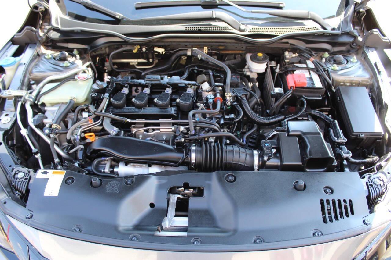 2021 Gray Honda Civic Sport Hatchback CVT (SHHFK7H41MU) with an 2.0L L4 DOHC 16V TURBO engine, CVT transmission, located at 4301 NW 39th , Oklahoma City, OK, 73112, (405) 949-5600, 35.512135, -97.598671 - NO DRIVERS LICENCE NO-FULL COVERAGE INSURANCE-NO CREDIT CHECK. COME ON OVER TO SUPERSPORTS AND TAKE A LOOK AND TEST DRIVE. PLEASE GIVE US A CALL AT (405) 949-5600. NO LICENSIA DE MANEJAR- NO SEGURO DE COBERTURA TOTAL- NO VERIFICACCION DE CREDITO. POR FAVOR VENGAN A SUPERSPORTS, ECHE UN - Photo#7