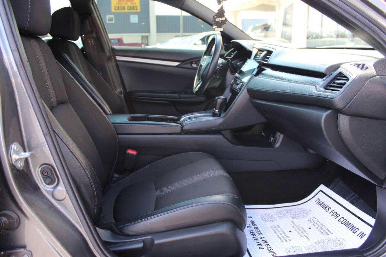 2021 Gray Honda Civic Sport Hatchback CVT (SHHFK7H41MU) with an 2.0L L4 DOHC 16V TURBO engine, CVT transmission, located at 4301 NW 39th , Oklahoma City, OK, 73112, (405) 949-5600, 35.512135, -97.598671 - NO DRIVERS LICENCE NO-FULL COVERAGE INSURANCE-NO CREDIT CHECK. COME ON OVER TO SUPERSPORTS AND TAKE A LOOK AND TEST DRIVE. PLEASE GIVE US A CALL AT (405) 949-5600. NO LICENSIA DE MANEJAR- NO SEGURO DE COBERTURA TOTAL- NO VERIFICACCION DE CREDITO. POR FAVOR VENGAN A SUPERSPORTS, ECHE UN - Photo#8