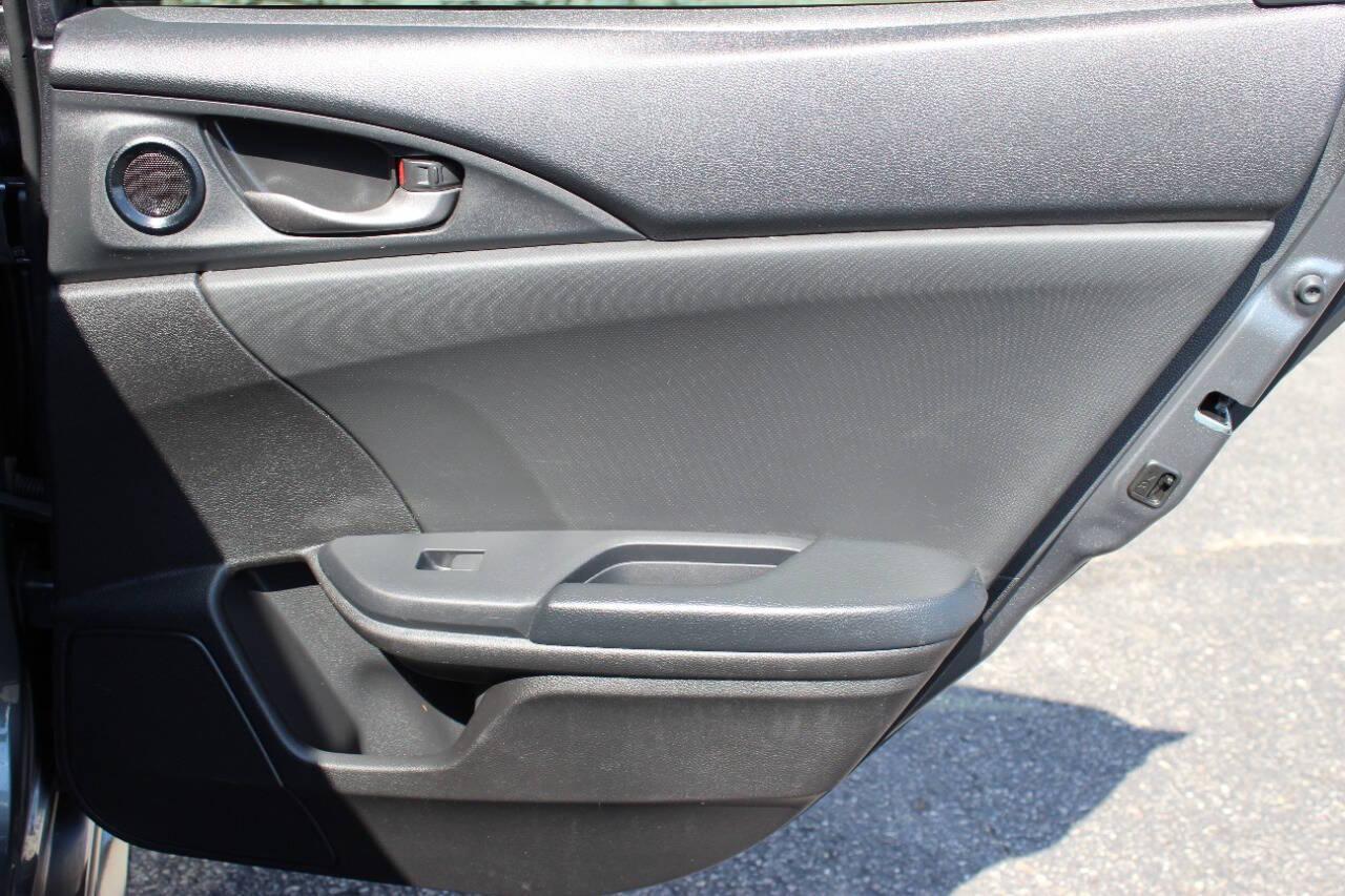 2021 Gray Honda Civic Sport Hatchback CVT (SHHFK7H41MU) with an 2.0L L4 DOHC 16V TURBO engine, CVT transmission, located at 4301 NW 39th , Oklahoma City, OK, 73112, (405) 949-5600, 35.512135, -97.598671 - NO DRIVERS LICENCE NO-FULL COVERAGE INSURANCE-NO CREDIT CHECK. COME ON OVER TO SUPERSPORTS AND TAKE A LOOK AND TEST DRIVE. PLEASE GIVE US A CALL AT (405) 949-5600. NO LICENSIA DE MANEJAR- NO SEGURO DE COBERTURA TOTAL- NO VERIFICACCION DE CREDITO. POR FAVOR VENGAN A SUPERSPORTS, ECHE UN - Photo#11