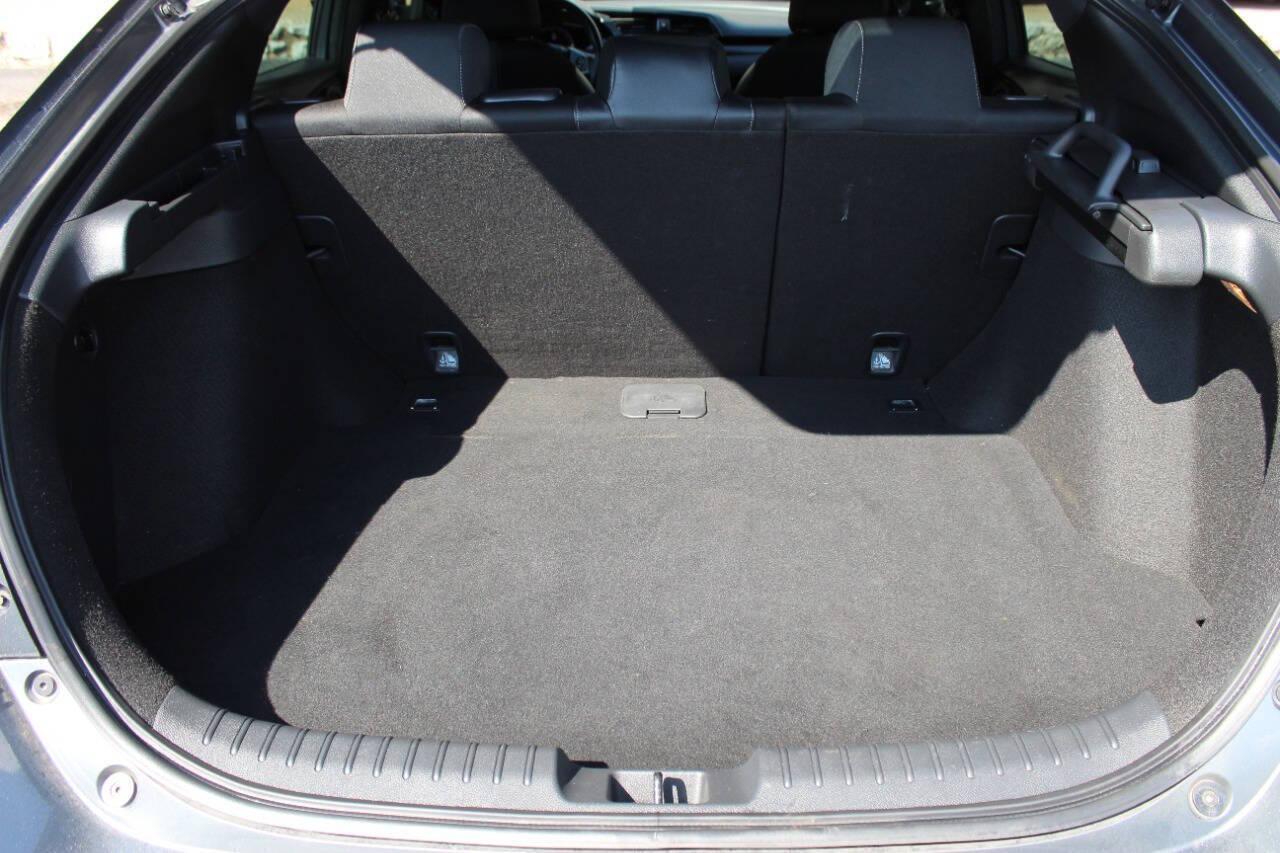 2021 Gray Honda Civic Sport Hatchback CVT (SHHFK7H41MU) with an 2.0L L4 DOHC 16V TURBO engine, CVT transmission, located at 4301 NW 39th , Oklahoma City, OK, 73112, (405) 949-5600, 35.512135, -97.598671 - NO DRIVERS LICENCE NO-FULL COVERAGE INSURANCE-NO CREDIT CHECK. COME ON OVER TO SUPERSPORTS AND TAKE A LOOK AND TEST DRIVE. PLEASE GIVE US A CALL AT (405) 949-5600. NO LICENSIA DE MANEJAR- NO SEGURO DE COBERTURA TOTAL- NO VERIFICACCION DE CREDITO. POR FAVOR VENGAN A SUPERSPORTS, ECHE UN - Photo#12