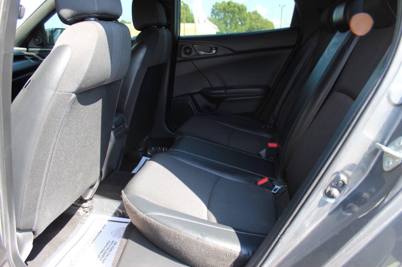 2021 Gray Honda Civic Sport Hatchback CVT (SHHFK7H41MU) with an 2.0L L4 DOHC 16V TURBO engine, CVT transmission, located at 4301 NW 39th , Oklahoma City, OK, 73112, (405) 949-5600, 35.512135, -97.598671 - NO DRIVERS LICENCE NO-FULL COVERAGE INSURANCE-NO CREDIT CHECK. COME ON OVER TO SUPERSPORTS AND TAKE A LOOK AND TEST DRIVE. PLEASE GIVE US A CALL AT (405) 949-5600. NO LICENSIA DE MANEJAR- NO SEGURO DE COBERTURA TOTAL- NO VERIFICACCION DE CREDITO. POR FAVOR VENGAN A SUPERSPORTS, ECHE UN - Photo#13