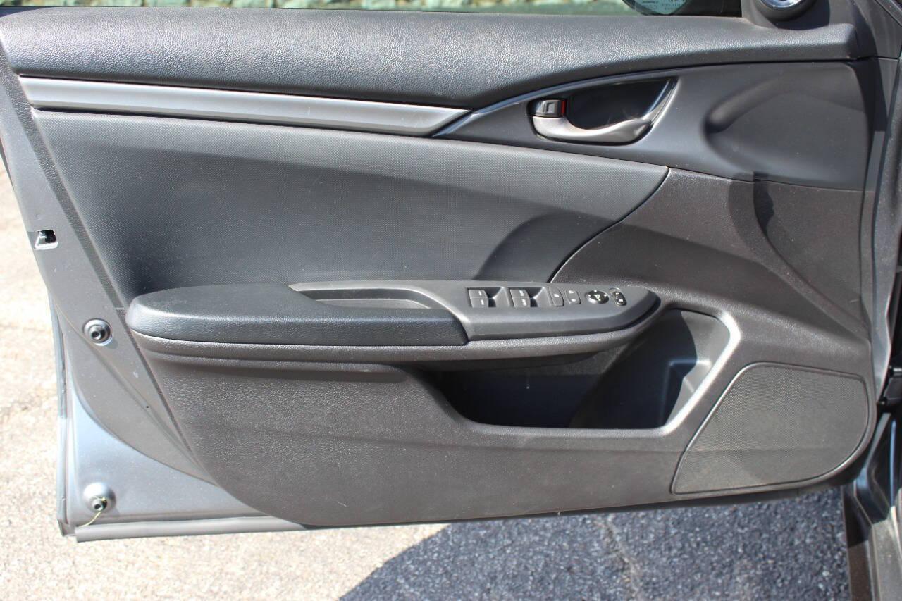 2021 Gray Honda Civic Sport Hatchback CVT (SHHFK7H41MU) with an 2.0L L4 DOHC 16V TURBO engine, CVT transmission, located at 4301 NW 39th , Oklahoma City, OK, 73112, (405) 949-5600, 35.512135, -97.598671 - NO DRIVERS LICENCE NO-FULL COVERAGE INSURANCE-NO CREDIT CHECK. COME ON OVER TO SUPERSPORTS AND TAKE A LOOK AND TEST DRIVE. PLEASE GIVE US A CALL AT (405) 949-5600. NO LICENSIA DE MANEJAR- NO SEGURO DE COBERTURA TOTAL- NO VERIFICACCION DE CREDITO. POR FAVOR VENGAN A SUPERSPORTS, ECHE UN - Photo#16