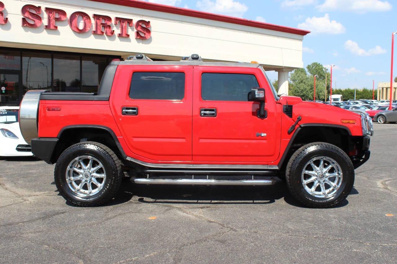 2005 Red Hummer H2 SUT (5GRGN22U05H) with an 6.0L V8 OHV 16V engine, 4-Speed Automatic Overdrive transmission, located at 4301 NW 39th , Oklahoma City, OK, 73112, (405) 949-5600, 35.512135, -97.598671 - NO DRIVERS LICENCE NO-FULL COVERAGE INSURANCE-NO CREDIT CHECK. COME ON OVER TO SUPERSPORTS AND TAKE A LOOK AND TEST DRIVE. PLEASE GIVE US A CALL AT (405) 949-5600. NO LICENSIA DE MANEJAR- NO SEGURO DE COBERTURA TOTAL- NO VERIFICACCION DE CREDITO. POR FAVOR VENGAN A SUPERSPORTS, ECHE UN - Photo#2