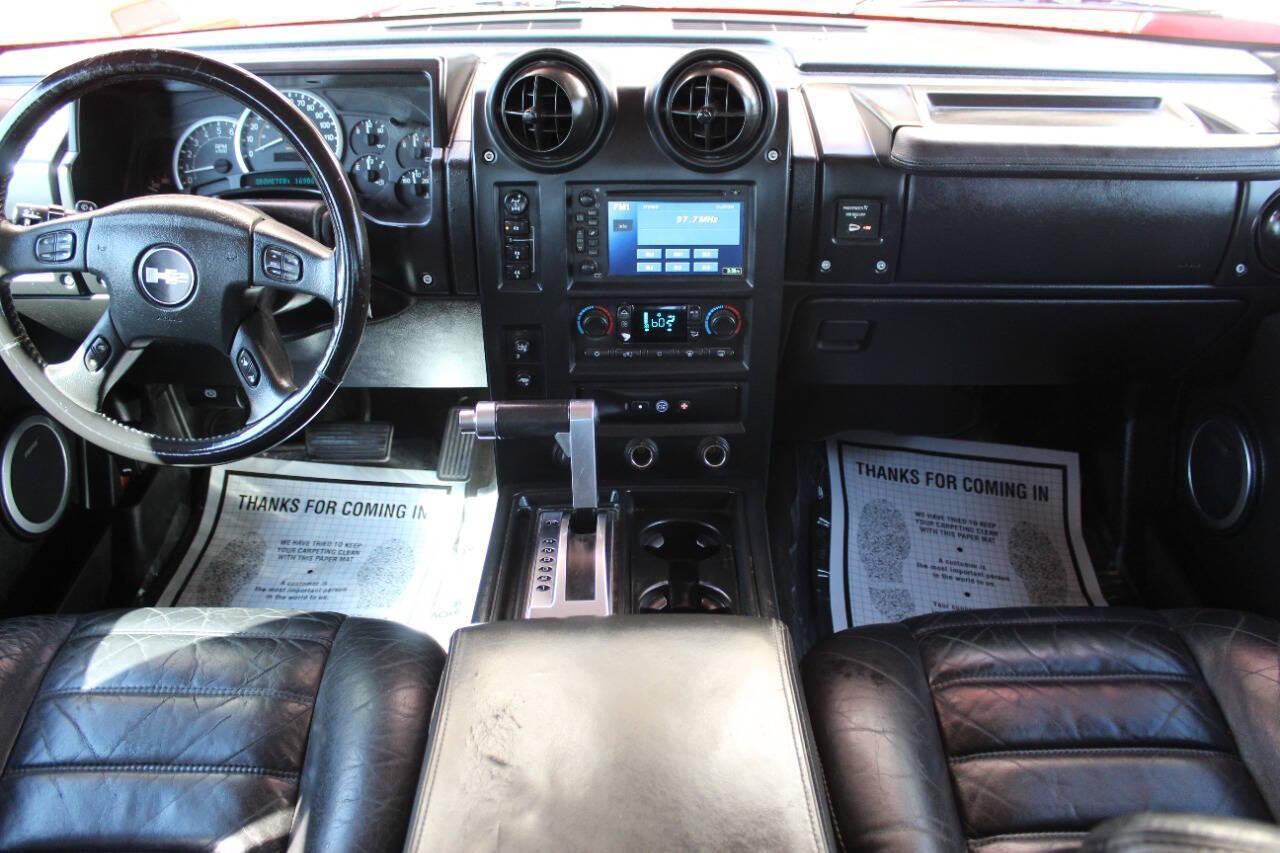 2005 Red Hummer H2 SUT (5GRGN22U05H) with an 6.0L V8 OHV 16V engine, 4-Speed Automatic Overdrive transmission, located at 4301 NW 39th , Oklahoma City, OK, 73112, (405) 949-5600, 35.512135, -97.598671 - NO DRIVERS LICENCE NO-FULL COVERAGE INSURANCE-NO CREDIT CHECK. COME ON OVER TO SUPERSPORTS AND TAKE A LOOK AND TEST DRIVE. PLEASE GIVE US A CALL AT (405) 949-5600. NO LICENSIA DE MANEJAR- NO SEGURO DE COBERTURA TOTAL- NO VERIFICACCION DE CREDITO. POR FAVOR VENGAN A SUPERSPORTS, ECHE UN - Photo#18