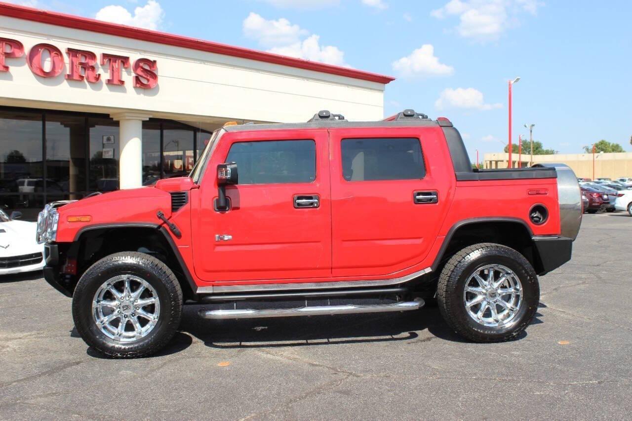 2005 Red Hummer H2 SUT (5GRGN22U05H) with an 6.0L V8 OHV 16V engine, 4-Speed Automatic Overdrive transmission, located at 4301 NW 39th , Oklahoma City, OK, 73112, (405) 949-5600, 35.512135, -97.598671 - NO DRIVERS LICENCE NO-FULL COVERAGE INSURANCE-NO CREDIT CHECK. COME ON OVER TO SUPERSPORTS AND TAKE A LOOK AND TEST DRIVE. PLEASE GIVE US A CALL AT (405) 949-5600. NO LICENSIA DE MANEJAR- NO SEGURO DE COBERTURA TOTAL- NO VERIFICACCION DE CREDITO. POR FAVOR VENGAN A SUPERSPORTS, ECHE UN - Photo#5