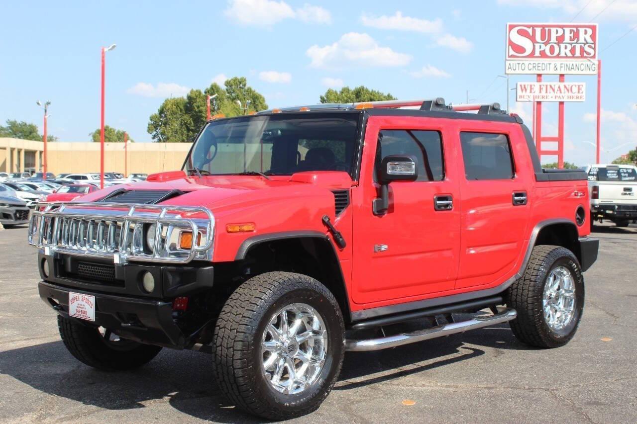 2005 Red Hummer H2 SUT (5GRGN22U05H) with an 6.0L V8 OHV 16V engine, 4-Speed Automatic Overdrive transmission, located at 4301 NW 39th , Oklahoma City, OK, 73112, (405) 949-5600, 35.512135, -97.598671 - NO DRIVERS LICENCE NO-FULL COVERAGE INSURANCE-NO CREDIT CHECK. COME ON OVER TO SUPERSPORTS AND TAKE A LOOK AND TEST DRIVE. PLEASE GIVE US A CALL AT (405) 949-5600. NO LICENSIA DE MANEJAR- NO SEGURO DE COBERTURA TOTAL- NO VERIFICACCION DE CREDITO. POR FAVOR VENGAN A SUPERSPORTS, ECHE UN - Photo#6
