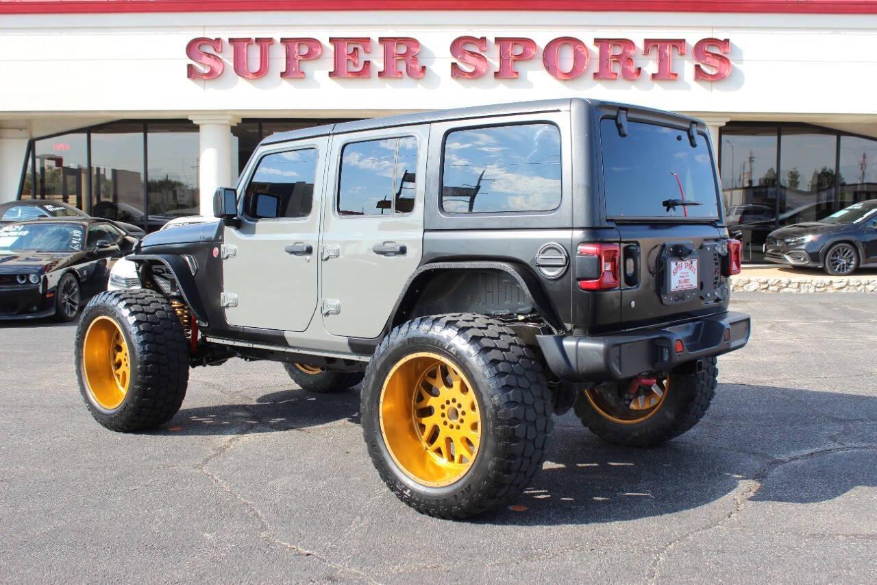 2020 Gray Jeep Wrangler Unlimited Rubicon (1C4HJXFN3LW) with an 2.0L L4 DOHC 16V TURBO engine, 6A transmission, located at 4301 NW 39th , Oklahoma City, OK, 73112, (405) 949-5600, 35.512135, -97.598671 - NO DRIVERS LICENCE -NO FULL COVERAGE INSURANCE - NO CREDIT CHECK. COME ON OVER TO SUPERSPORTS, TAKE A LOOK AND TEST DRIVE. PLEASE GIVE US A CALL AT (405) 949-5600. NO LICENCIA DE CONDUCIR - NO SEGURO DE COBERTURA TOTAL - NO VERIFICACION DE CREDITO. VISITENOS EN SUPERSPORTS, MIRE NUESTRO - Photo#4