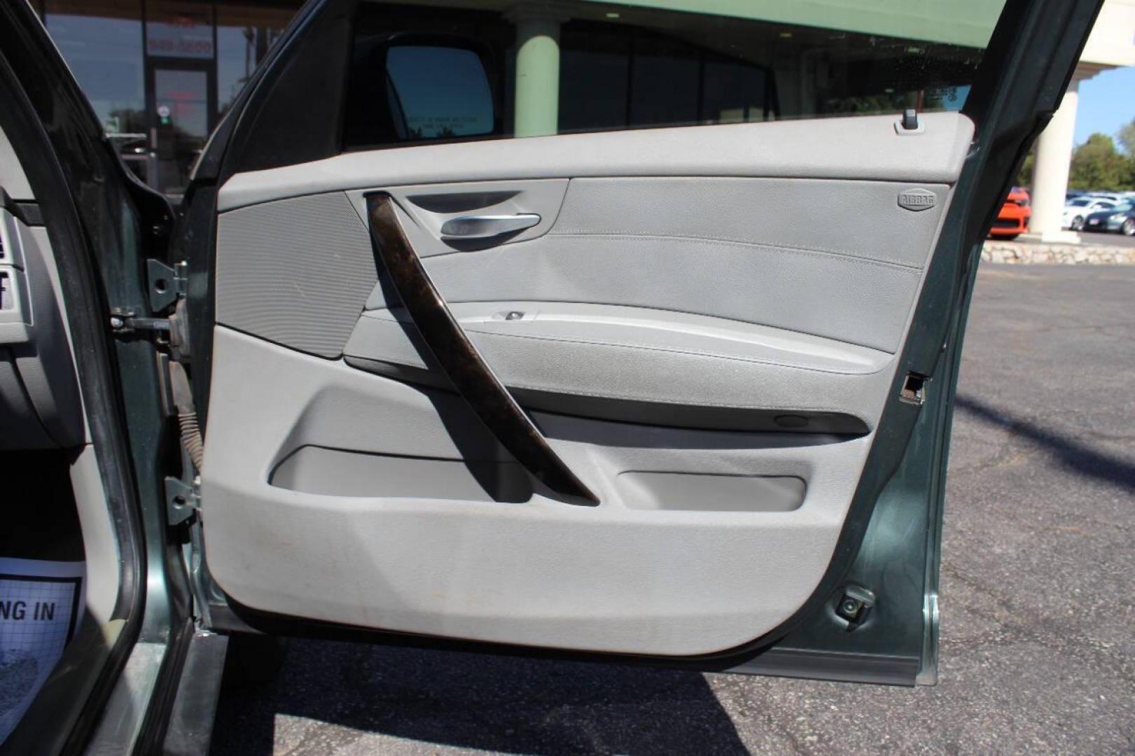 2008 Green BMW X3 3.0si (WBXPC93418W) with an 3.0L L6 DOHC 24V engine, Automatic 6-Speed transmission, located at 4301 NW 39th , Oklahoma City, OK, 73112, (405) 949-5600, 35.512135, -97.598671 - NO DRIVERS LICENCE -NO FULL COVERAGE INSURANCE - NO CREDIT CHECK. COME ON OVER TO SUPERSPORTS, TAKE A LOOK AND TEST DRIVE. PLEASE GIVE US A CALL AT (405) 949-5600. NO LICENCIA DE CONDUCIR - NO SEGURO DE COBERTURA TOTAL - NO VERIFICACION DE CREDITO. VISITENOS EN SUPERSPORTS, MIRE NUESTRO - Photo#8