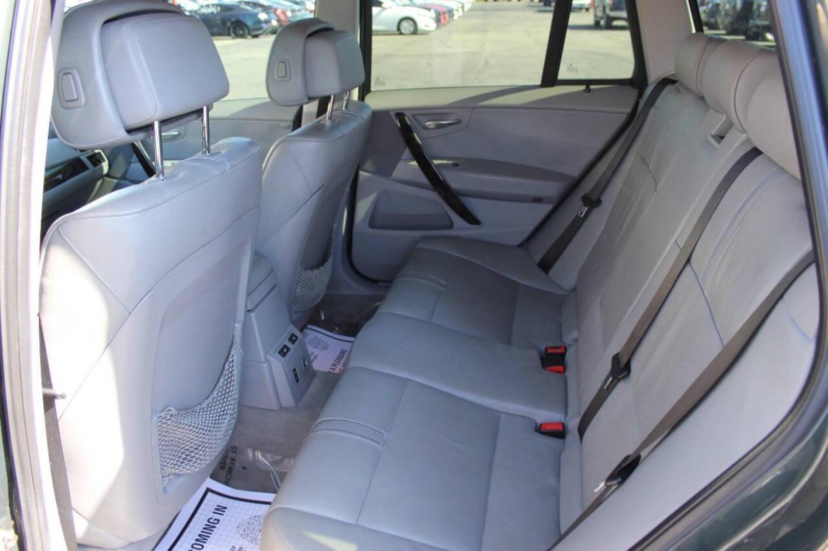 2008 Green BMW X3 3.0si (WBXPC93418W) with an 3.0L L6 DOHC 24V engine, Automatic 6-Speed transmission, located at 4301 NW 39th , Oklahoma City, OK, 73112, (405) 949-5600, 35.512135, -97.598671 - NO DRIVERS LICENCE -NO FULL COVERAGE INSURANCE - NO CREDIT CHECK. COME ON OVER TO SUPERSPORTS, TAKE A LOOK AND TEST DRIVE. PLEASE GIVE US A CALL AT (405) 949-5600. NO LICENCIA DE CONDUCIR - NO SEGURO DE COBERTURA TOTAL - NO VERIFICACION DE CREDITO. VISITENOS EN SUPERSPORTS, MIRE NUESTRO - Photo#12