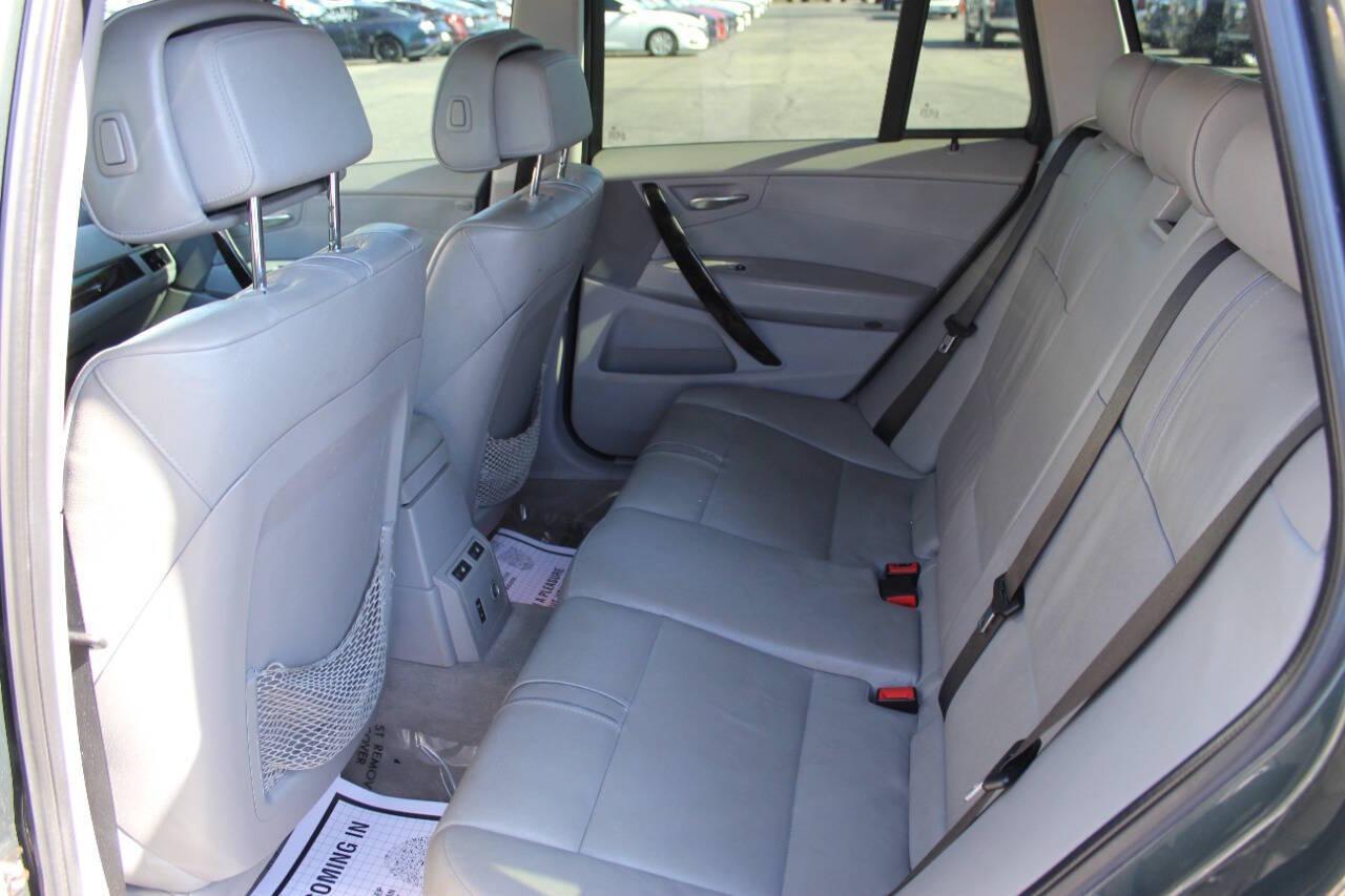 2008 Green BMW X3 3.0si (WBXPC93418W) with an 3.0L L6 DOHC 24V engine, Automatic 6-Speed transmission, located at 4301 NW 39th , Oklahoma City, OK, 73112, (405) 949-5600, 35.512135, -97.598671 - NO DRIVERS LICENCE -NO FULL COVERAGE INSURANCE - NO CREDIT CHECK. COME ON OVER TO SUPERSPORTS, TAKE A LOOK AND TEST DRIVE. PLEASE GIVE US A CALL AT (405) 949-5600. NO LICENCIA DE CONDUCIR - NO SEGURO DE COBERTURA TOTAL - NO VERIFICACION DE CREDITO. VISITENOS EN SUPERSPORTS, MIRE NUESTRO - Photo#12