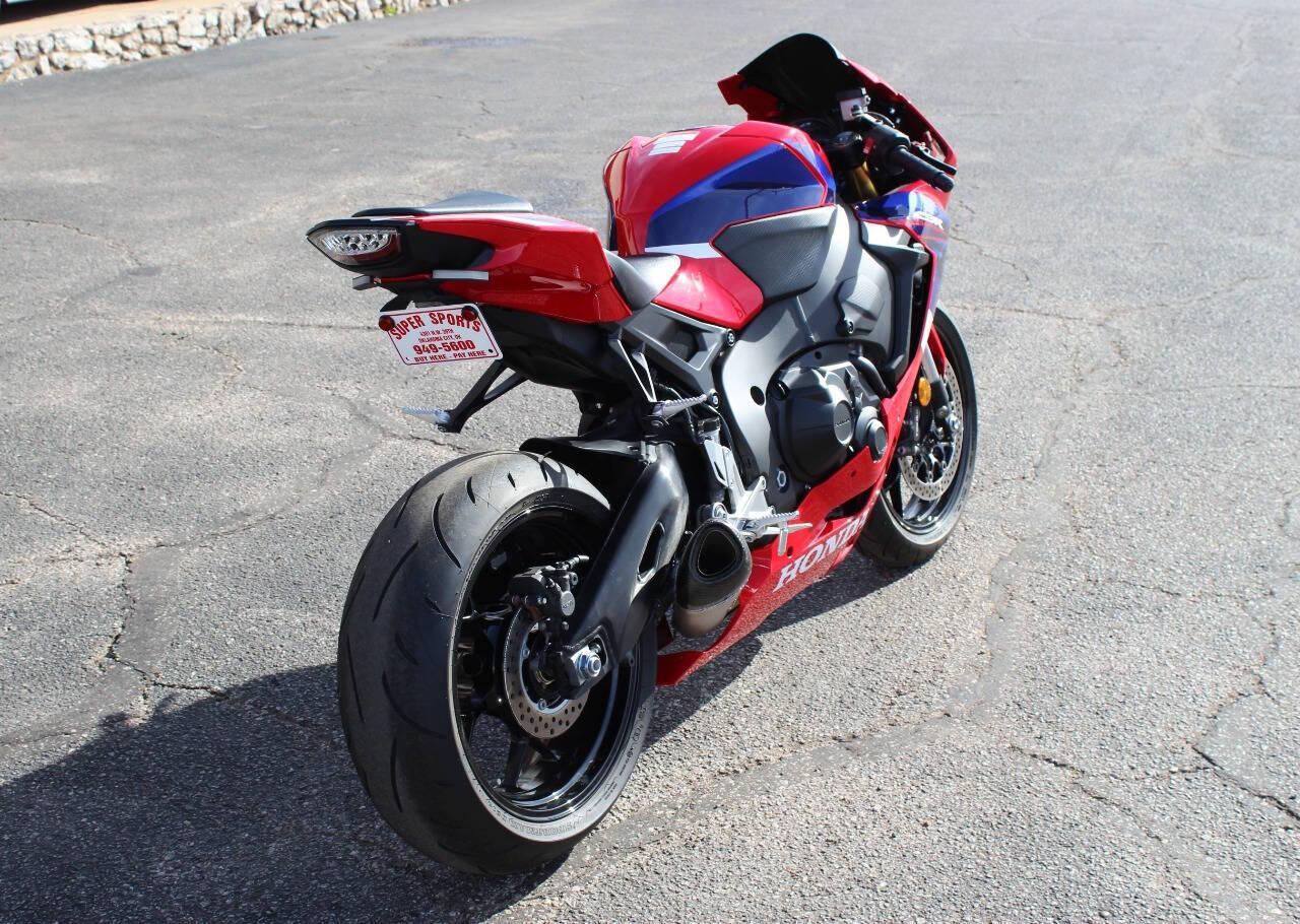 2023 Red Honda CBR 1000 RR - (JH2SC7755PK) with an 1000cc Unspecified engine, Manual 6-Speed transmission, located at 4301 NW 39th , Oklahoma City, OK, 73112, (405) 949-5600, 35.512135, -97.598671 - NO DRIVERS LICENCE -NO FULL COVERAGE INSURANCE - NO CREDIT CHECK. COME ON OVER TO SUPERSPORTS, TAKE A LOOK AND TEST DRIVE. PLEASE GIVE US A CALL AT (405) 949-5600. NO LICENCIA DE CONDUCIR - NO SEGURO DE COBERTURA TOTAL - NO VERIFICACION DE CREDITO. VISI - Photo#3