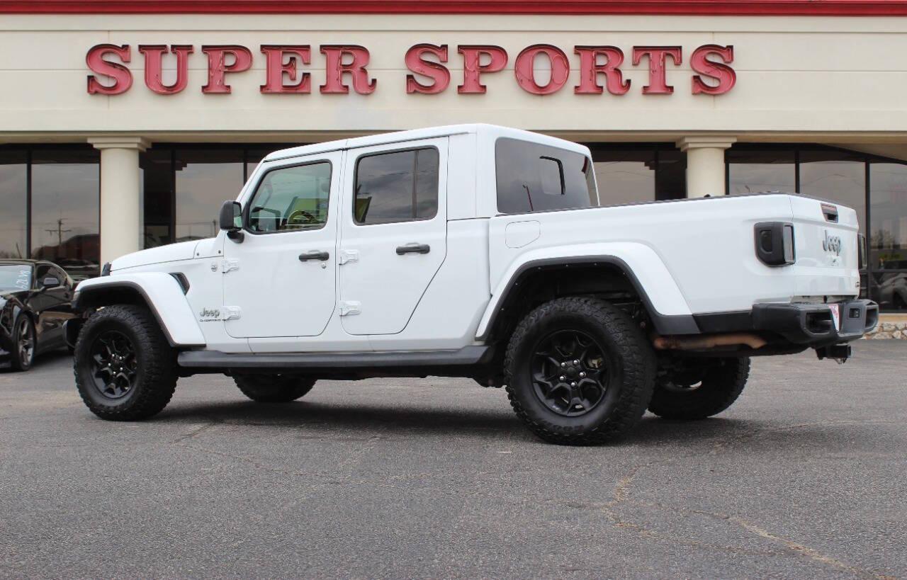 2023 White Jeep Gladiator Overland (1C6HJTFG9PL) with an 3.6L V6 285hp 260ft. lbs. 3.6L V6 engine, Automatic 8-Speed transmission, located at 4301 NW 39th , Oklahoma City, OK, 73112, (405) 949-5600, 35.512135, -97.598671 - NO DRIVERS LICENCE -NO FULL COVERAGE INSURANCE - NO CREDIT CHECK. COME ON OVER TO SUPERSPORTS, TAKE A LOOK AND TEST DRIVE. PLEASE GIVE US A CALL AT (405) 949-5600. NO LICENCIA DE CONDUCIR - NO SEGURO DE COBERTURA TOTAL - NO VERIFICACION DE CREDITO. VISITENOS EN SUPERSPORTS, MIRE NUEST - Photo#4