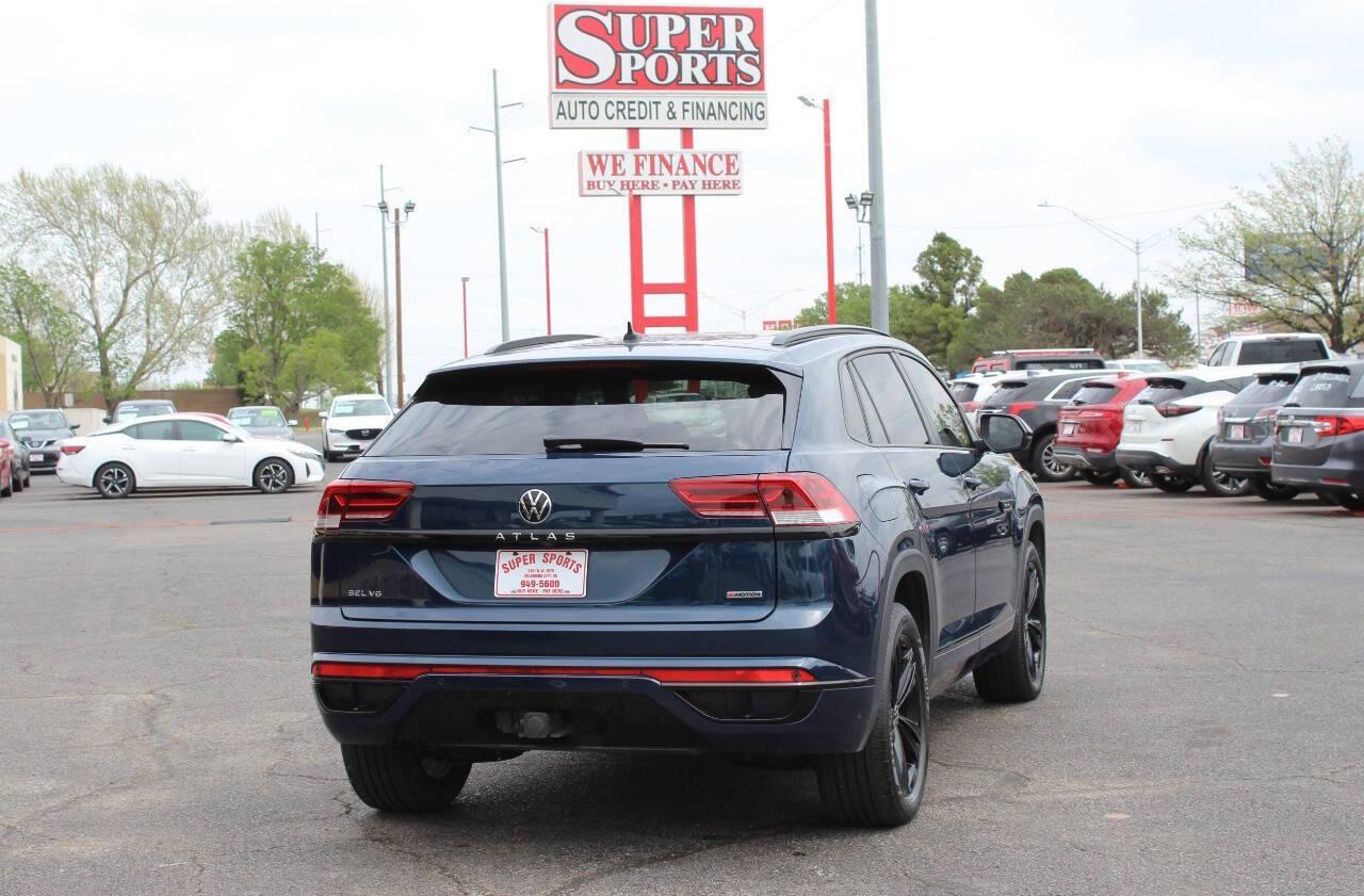 2022 Blue Volkswagen Atlas Cross Sport SEL R-Line 4MOTION (1V2AE2CA9NC) with an 3.6L V6 276hp 266ft. lbs. 3.6L V6 engine, Automatic 8-Speed transmission, located at 4301 NW 39th , Oklahoma City, OK, 73112, (405) 949-5600, 35.512135, -97.598671 - NO DRIVERS LICENCE -NO FULL COVERAGE INSURANCE - NO CREDIT CHECK. COME ON OVER TO SUPERSPORTS, TAKE A LOOK AND TEST DRIVE. PLEASE GIVE US A CALL AT (405) 949-5600. NO LICENCIA DE CONDUCIR - NO SEGURO DE COBERTURA TOTAL - NO VERIFICACION DE CREDITO. VISITENOS EN SUPERSPORTS, MIRE NUESTRO - Photo#4
