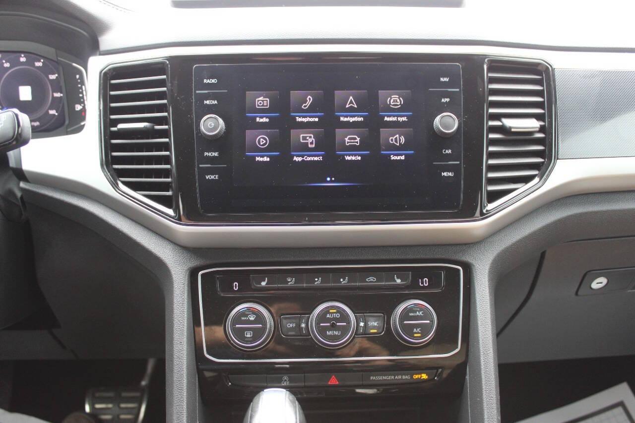 2022 Blue Volkswagen Atlas Cross Sport SEL R-Line 4MOTION (1V2AE2CA9NC) with an 3.6L V6 276hp 266ft. lbs. 3.6L V6 engine, Automatic 8-Speed transmission, located at 4301 NW 39th , Oklahoma City, OK, 73112, (405) 949-5600, 35.512135, -97.598671 - NO DRIVERS LICENCE -NO FULL COVERAGE INSURANCE - NO CREDIT CHECK. COME ON OVER TO SUPERSPORTS, TAKE A LOOK AND TEST DRIVE. PLEASE GIVE US A CALL AT (405) 949-5600. NO LICENCIA DE CONDUCIR - NO SEGURO DE COBERTURA TOTAL - NO VERIFICACION DE CREDITO. VISITENOS EN SUPERSPORTS, MIRE NUESTRO - Photo#21