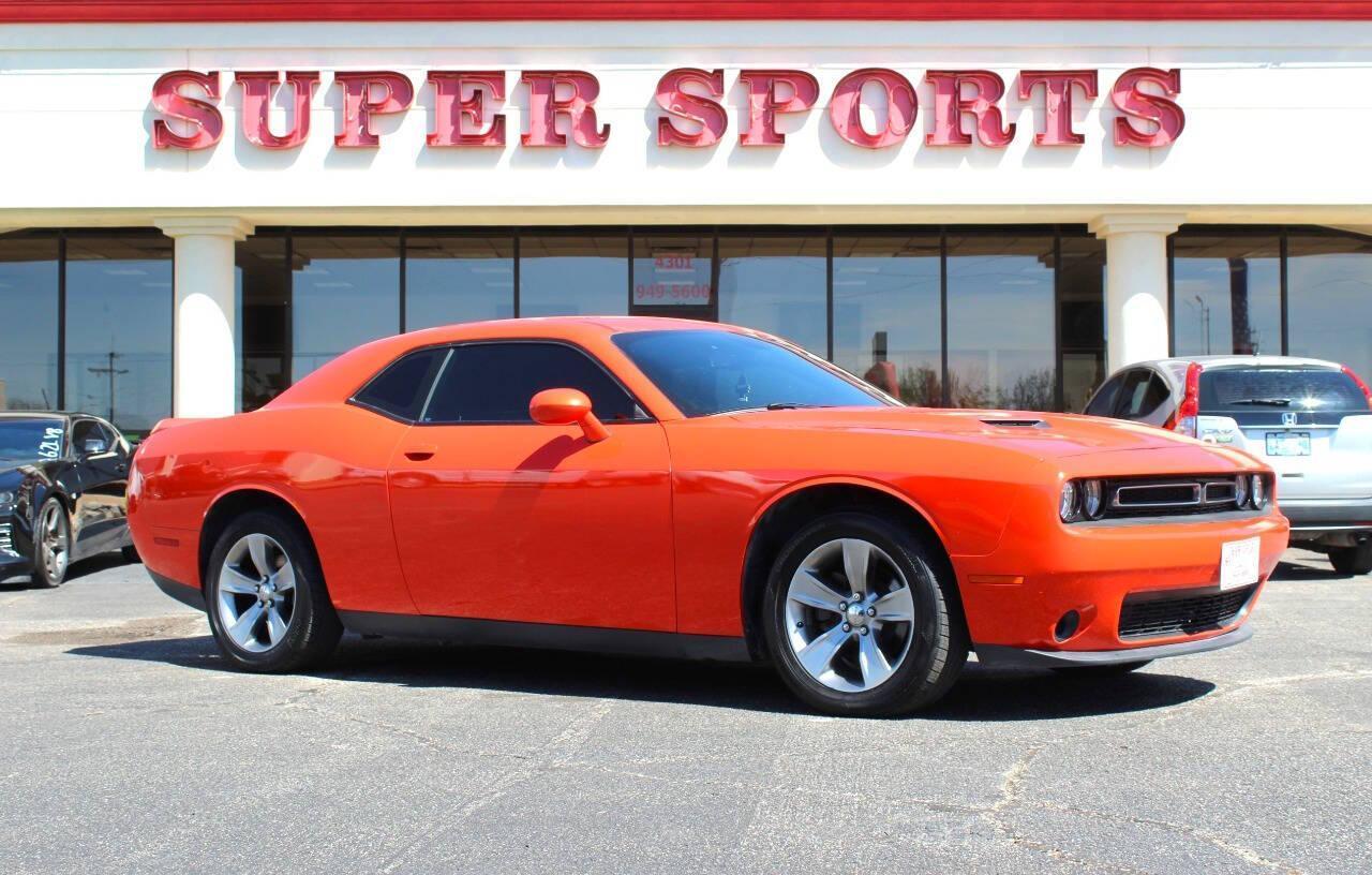 2019 Orange Dodge Challenger SXT (2C3CDZAG8KH) with an Pentastar 3.6L V6 305hp 268ft. lbs. 3.6L V6 engine, Automatic 8-Speed transmission, located at 4301 NW 39th , Oklahoma City, OK, 73112, (405) 949-5600, 35.512135, -97.598671 - NO DRIVERS LICENCE -NO FULL COVERAGE INSURANCE - NO CREDIT CHECK. COME ON OVER TO SUPERSPORTS, TAKE A LOOK AND TEST DRIVE. PLEASE GIVE US A CALL AT (405) 949-5600. NO LICENCIA DE CONDUCIR - NO SEGURO DE COBERTURA TOTAL - NO VERIFICACION DE CREDITO. VISITENOS EN SUPERSPORTS, MIRE NUESTRO - Photo#0