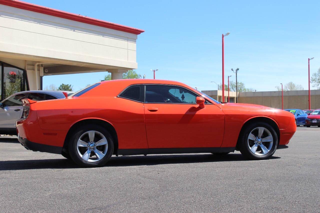 2019 Orange Dodge Challenger SXT (2C3CDZAG8KH) with an Pentastar 3.6L V6 305hp 268ft. lbs. 3.6L V6 engine, Automatic 8-Speed transmission, located at 4301 NW 39th , Oklahoma City, OK, 73112, (405) 949-5600, 35.512135, -97.598671 - NO DRIVERS LICENCE -NO FULL COVERAGE INSURANCE - NO CREDIT CHECK. COME ON OVER TO SUPERSPORTS, TAKE A LOOK AND TEST DRIVE. PLEASE GIVE US A CALL AT (405) 949-5600. NO LICENCIA DE CONDUCIR - NO SEGURO DE COBERTURA TOTAL - NO VERIFICACION DE CREDITO. VISITENOS EN SUPERSPORTS, MIRE NUESTRO - Photo#2