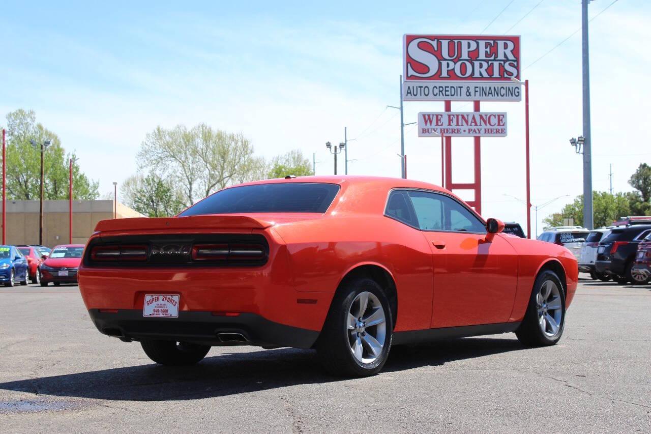 2019 Orange Dodge Challenger SXT (2C3CDZAG8KH) with an Pentastar 3.6L V6 305hp 268ft. lbs. 3.6L V6 engine, Automatic 8-Speed transmission, located at 4301 NW 39th , Oklahoma City, OK, 73112, (405) 949-5600, 35.512135, -97.598671 - NO DRIVERS LICENCE -NO FULL COVERAGE INSURANCE - NO CREDIT CHECK. COME ON OVER TO SUPERSPORTS, TAKE A LOOK AND TEST DRIVE. PLEASE GIVE US A CALL AT (405) 949-5600. NO LICENCIA DE CONDUCIR - NO SEGURO DE COBERTURA TOTAL - NO VERIFICACION DE CREDITO. VISITENOS EN SUPERSPORTS, MIRE NUESTRO - Photo#3