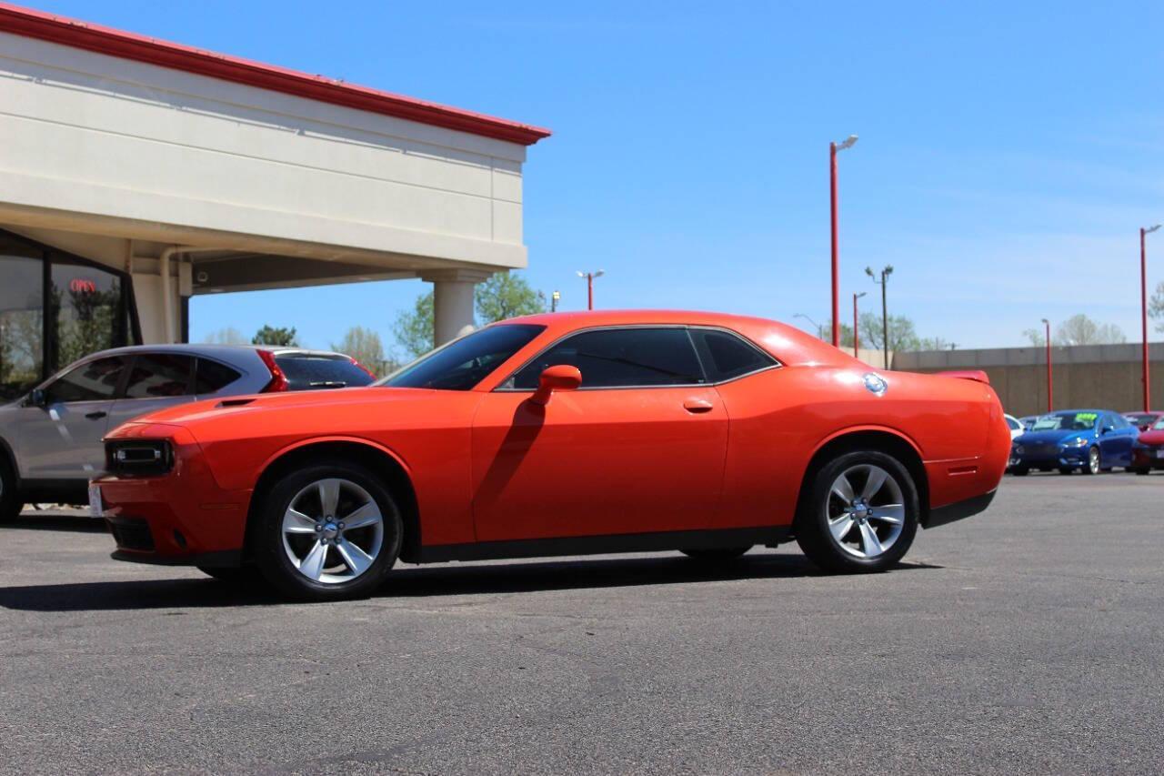 2019 Orange Dodge Challenger SXT (2C3CDZAG8KH) with an Pentastar 3.6L V6 305hp 268ft. lbs. 3.6L V6 engine, Automatic 8-Speed transmission, located at 4301 NW 39th , Oklahoma City, OK, 73112, (405) 949-5600, 35.512135, -97.598671 - NO DRIVERS LICENCE -NO FULL COVERAGE INSURANCE - NO CREDIT CHECK. COME ON OVER TO SUPERSPORTS, TAKE A LOOK AND TEST DRIVE. PLEASE GIVE US A CALL AT (405) 949-5600. NO LICENCIA DE CONDUCIR - NO SEGURO DE COBERTURA TOTAL - NO VERIFICACION DE CREDITO. VISITENOS EN SUPERSPORTS, MIRE NUESTRO - Photo#5