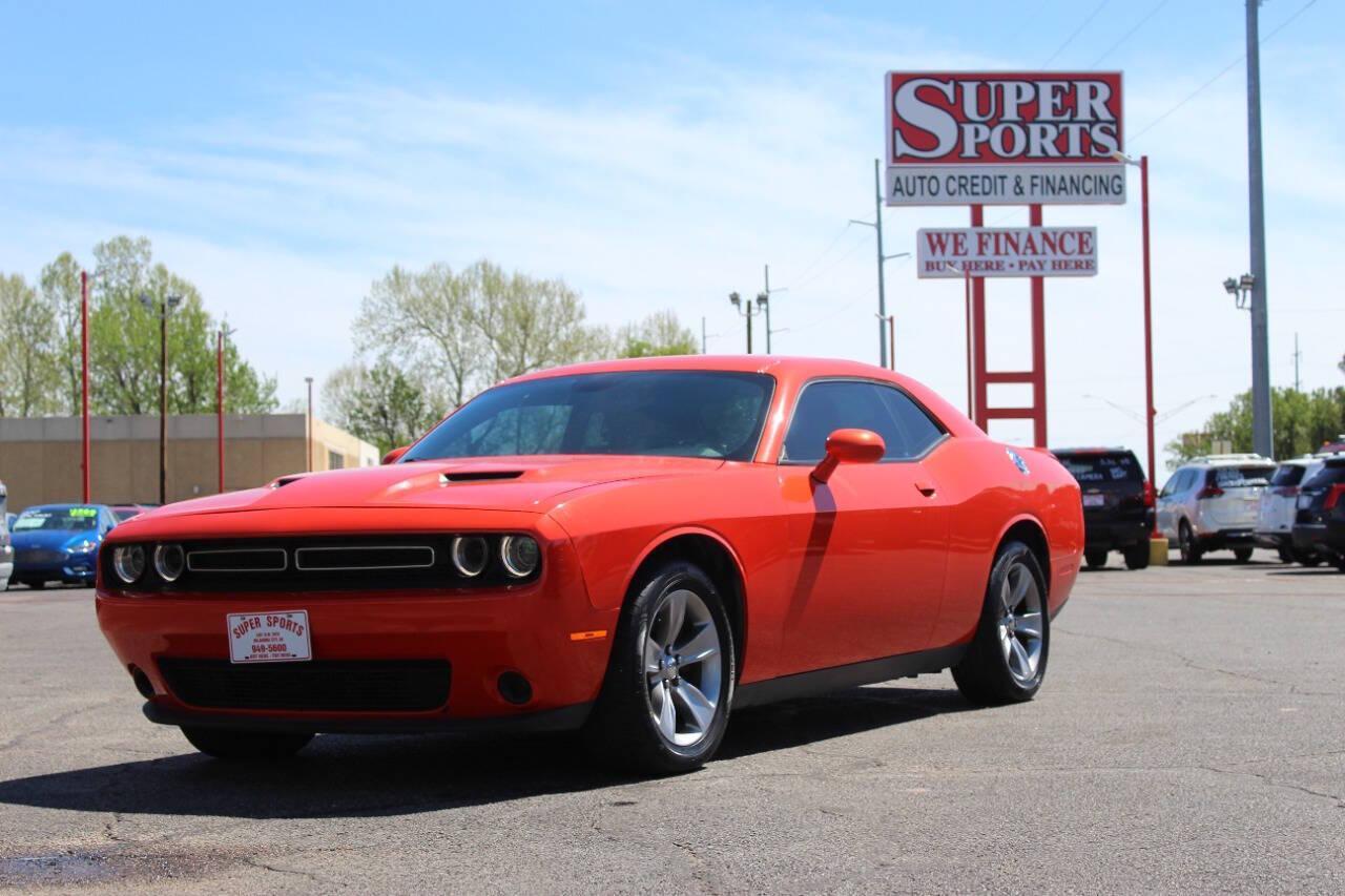 2019 Orange Dodge Challenger SXT (2C3CDZAG8KH) with an Pentastar 3.6L V6 305hp 268ft. lbs. 3.6L V6 engine, Automatic 8-Speed transmission, located at 4301 NW 39th , Oklahoma City, OK, 73112, (405) 949-5600, 35.512135, -97.598671 - NO DRIVERS LICENCE -NO FULL COVERAGE INSURANCE - NO CREDIT CHECK. COME ON OVER TO SUPERSPORTS, TAKE A LOOK AND TEST DRIVE. PLEASE GIVE US A CALL AT (405) 949-5600. NO LICENCIA DE CONDUCIR - NO SEGURO DE COBERTURA TOTAL - NO VERIFICACION DE CREDITO. VISITENOS EN SUPERSPORTS, MIRE NUESTRO - Photo#6