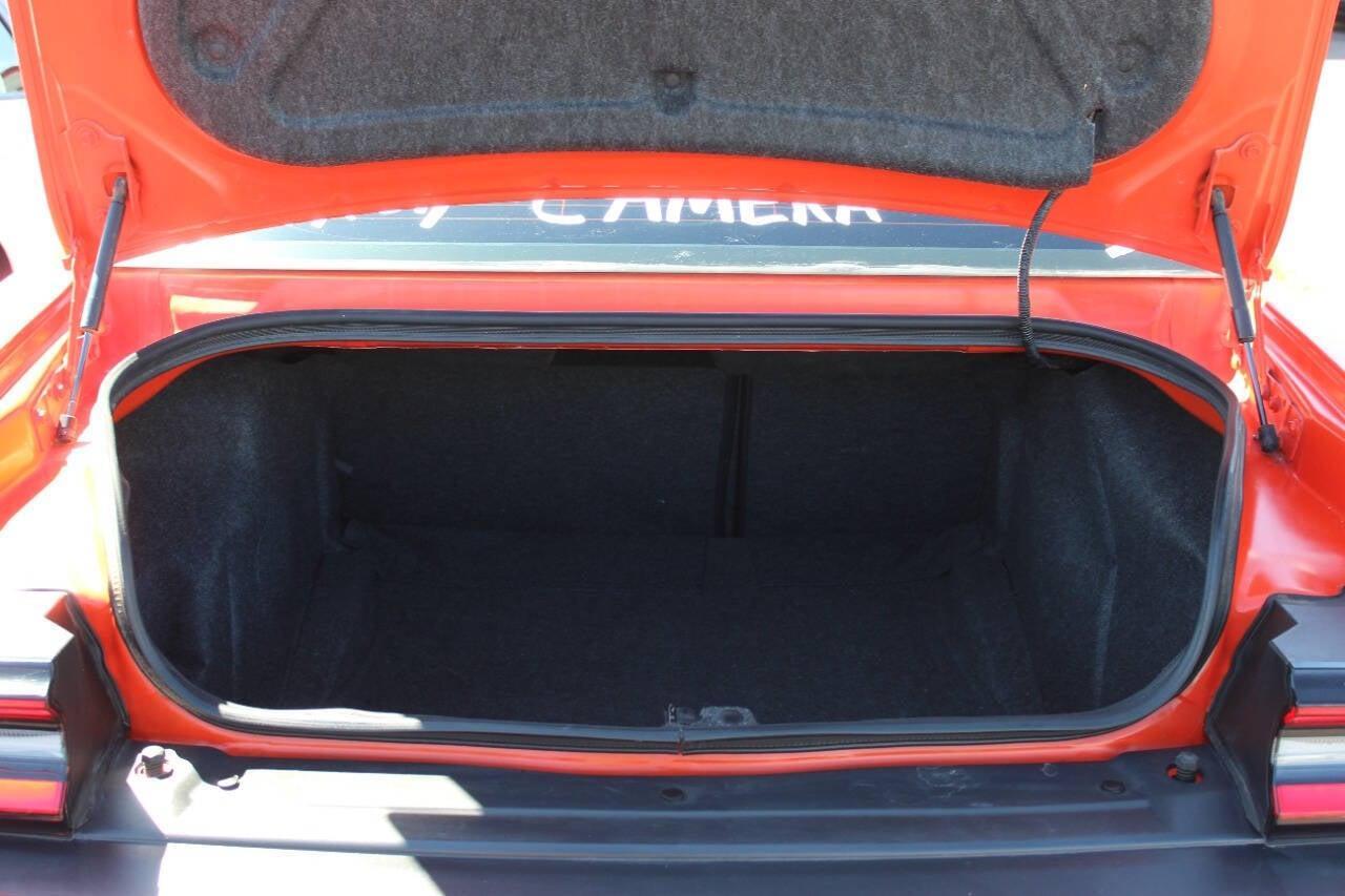 2019 Orange Dodge Challenger SXT (2C3CDZAG8KH) with an Pentastar 3.6L V6 305hp 268ft. lbs. 3.6L V6 engine, Automatic 8-Speed transmission, located at 4301 NW 39th , Oklahoma City, OK, 73112, (405) 949-5600, 35.512135, -97.598671 - NO DRIVERS LICENCE -NO FULL COVERAGE INSURANCE - NO CREDIT CHECK. COME ON OVER TO SUPERSPORTS, TAKE A LOOK AND TEST DRIVE. PLEASE GIVE US A CALL AT (405) 949-5600. NO LICENCIA DE CONDUCIR - NO SEGURO DE COBERTURA TOTAL - NO VERIFICACION DE CREDITO. VISITENOS EN SUPERSPORTS, MIRE NUESTRO - Photo#10