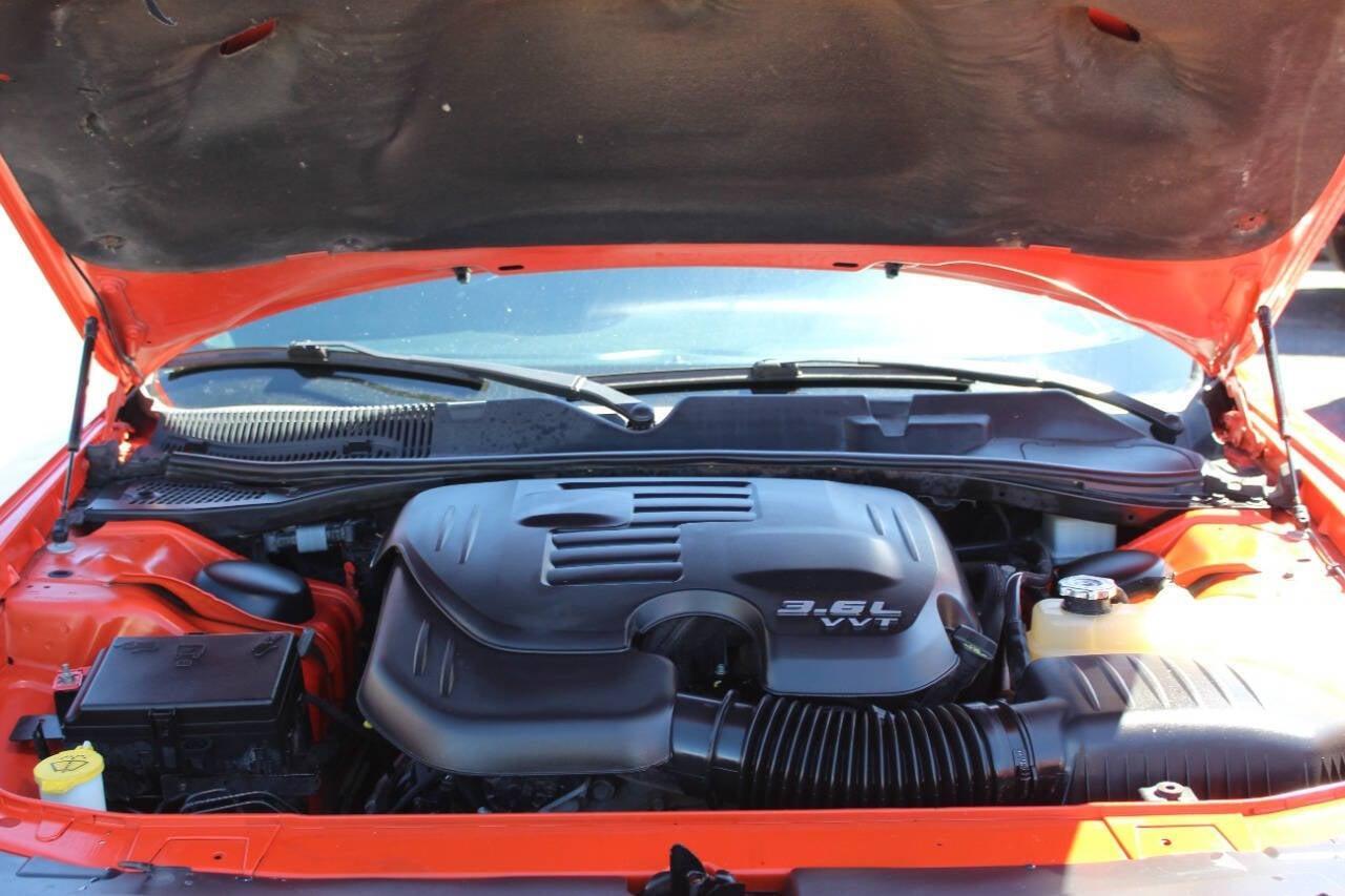 2019 Orange Dodge Challenger SXT (2C3CDZAG8KH) with an Pentastar 3.6L V6 305hp 268ft. lbs. 3.6L V6 engine, Automatic 8-Speed transmission, located at 4301 NW 39th , Oklahoma City, OK, 73112, (405) 949-5600, 35.512135, -97.598671 - NO DRIVERS LICENCE -NO FULL COVERAGE INSURANCE - NO CREDIT CHECK. COME ON OVER TO SUPERSPORTS, TAKE A LOOK AND TEST DRIVE. PLEASE GIVE US A CALL AT (405) 949-5600. NO LICENCIA DE CONDUCIR - NO SEGURO DE COBERTURA TOTAL - NO VERIFICACION DE CREDITO. VISITENOS EN SUPERSPORTS, MIRE NUESTRO - Photo#13