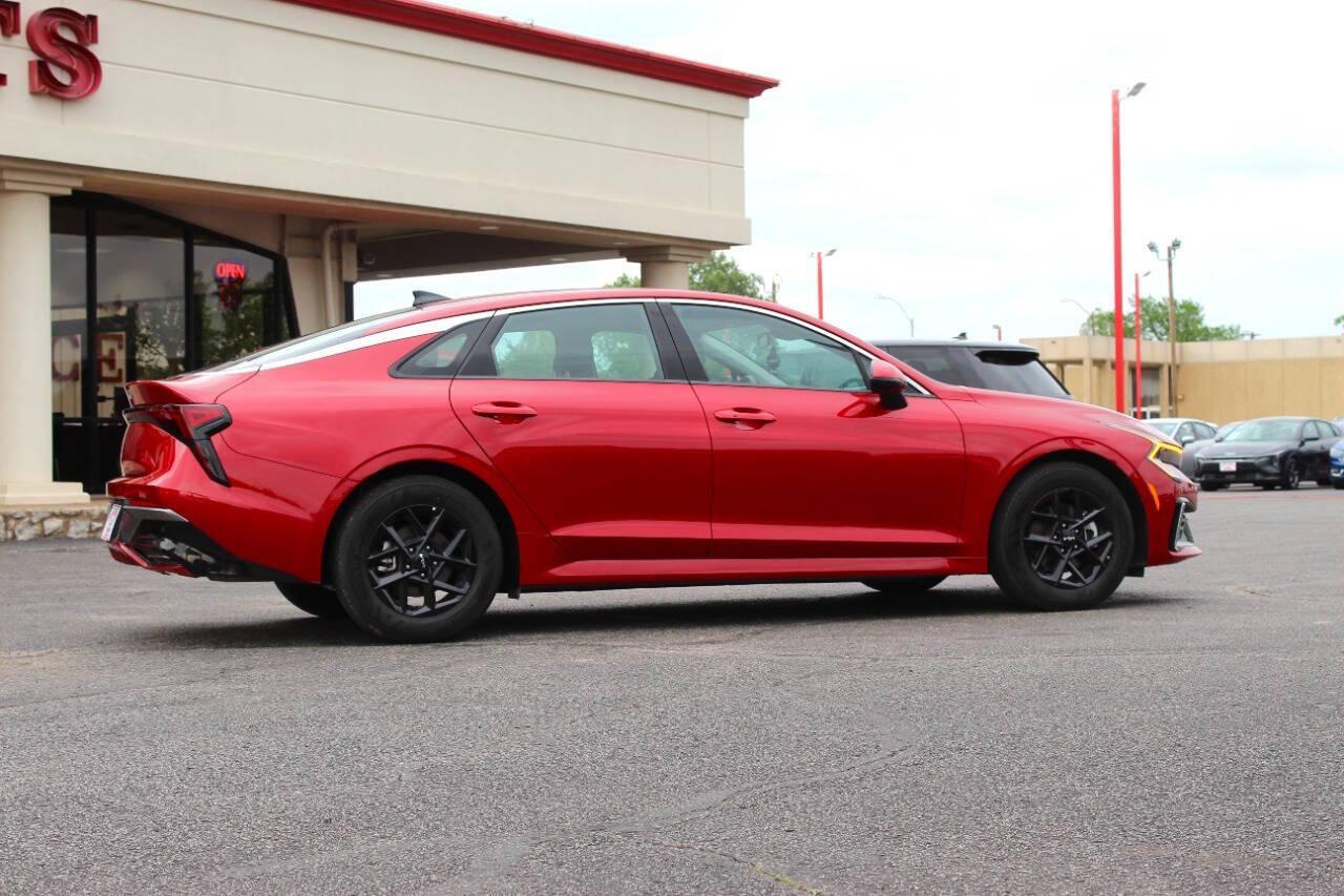 2025 Red Kia K5 LXS (KNAG24J7XS5) with an 2.5L I4 191hp 181ft. lbs. 2.5L I4 engine, Automatic 8-Speed transmission, located at 4301 NW 39th , Oklahoma City, OK, 73112, (405) 949-5600, 35.512135, -97.598671 - NO DRIVERS LICENCE -NO FULL COVERAGE INSURANCE - NO CREDIT CHECK. COME ON OVER TO SUPERSPORTS, TAKE A LOOK AND TEST DRIVE. PLEASE GIVE US A CALL AT (405) 949-5600. NO LICENCIA DE CONDUCIR - NO SEGURO DE COBERTURA TOTAL - NO VERIFICACION DE CREDITO. VISITENOS EN SUPERSPORTS, MIRE NUESTRO - Photo#2