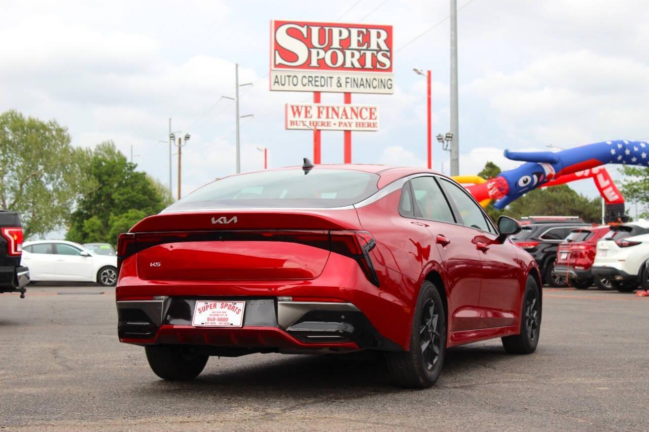 2025 Red Kia K5 LXS (KNAG24J7XS5) with an 2.5L I4 191hp 181ft. lbs. 2.5L I4 engine, Automatic 8-Speed transmission, located at 4301 NW 39th , Oklahoma City, OK, 73112, (405) 949-5600, 35.512135, -97.598671 - NO DRIVERS LICENCE -NO FULL COVERAGE INSURANCE - NO CREDIT CHECK. COME ON OVER TO SUPERSPORTS, TAKE A LOOK AND TEST DRIVE. PLEASE GIVE US A CALL AT (405) 949-5600. NO LICENCIA DE CONDUCIR - NO SEGURO DE COBERTURA TOTAL - NO VERIFICACION DE CREDITO. VISITENOS EN SUPERSPORTS, MIRE NUESTRO - Photo#3