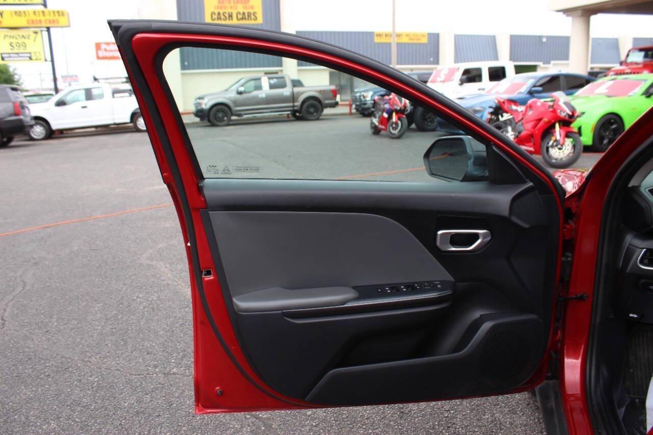 2025 Red Kia K4 LX (3KPFT4DE4SE) with an 2.0L I4 147hp 132ft. lbs. SULEV 2.0L I4 engine, CVT transmission, located at 4301 NW 39th , Oklahoma City, OK, 73112, (405) 949-5600, 35.512135, -97.598671 - NO DRIVERS LICENCE -NO FULL COVERAGE INSURANCE - NO CREDIT CHECK. COME ON OVER TO SUPERSPORTS, TAKE A LOOK AND TEST DRIVE. PLEASE GIVE US A CALL AT (405) 949-5600. NO LICENCIA DE CONDUCIR - NO SEGURO DE COBERTURA TOTAL - NO VERIFICACION DE CREDITO. VISITENOS EN SUPERSPORTS, MIRE NUESTRO - Photo#16