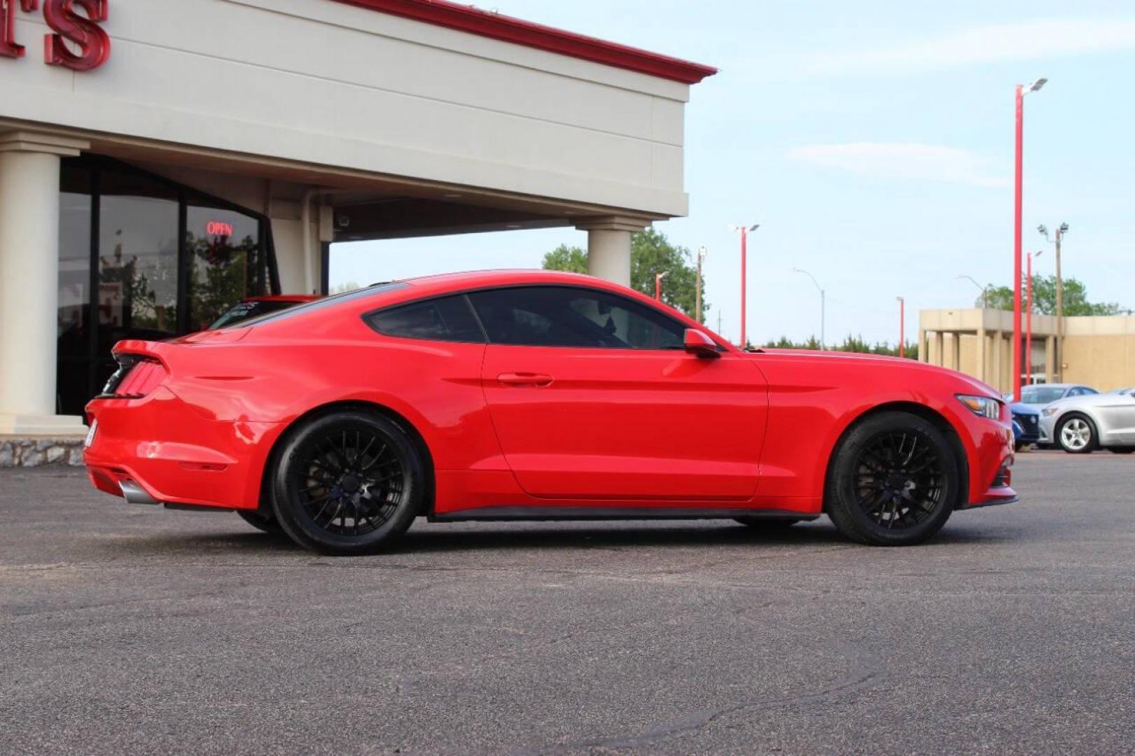 2015 Red Ford Mustang V6 Coupe (1FA6P8AM7F5) with an 3.7L V6 3.7L V6 engine, Automatic 6-Speed transmission, located at 4301 NW 39th , Oklahoma City, OK, 73112, (405) 949-5600, 35.512135, -97.598671 - NO DRIVERS LICENCE -NO FULL COVERAGE INSURANCE - NO CREDIT CHECK. COME ON OVER TO SUPERSPORTS, TAKE A LOOK AND TEST DRIVE. PLEASE GIVE US A CALL AT (405) 949-5600. NO LICENCIA DE CONDUCIR - NO SEGURO DE COBERTURA TOTAL - NO VERIFICACION DE CREDITO. VISITENOS EN SUPERSPORTS, MIRE NUESTRO - Photo#2