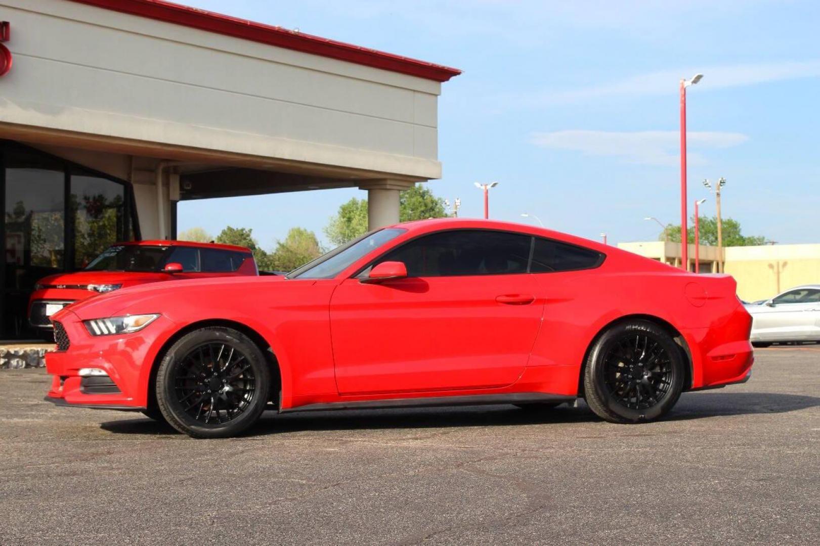 2015 Red Ford Mustang V6 Coupe (1FA6P8AM7F5) with an 3.7L V6 3.7L V6 engine, Automatic 6-Speed transmission, located at 4301 NW 39th , Oklahoma City, OK, 73112, (405) 949-5600, 35.512135, -97.598671 - NO DRIVERS LICENCE -NO FULL COVERAGE INSURANCE - NO CREDIT CHECK. COME ON OVER TO SUPERSPORTS, TAKE A LOOK AND TEST DRIVE. PLEASE GIVE US A CALL AT (405) 949-5600. NO LICENCIA DE CONDUCIR - NO SEGURO DE COBERTURA TOTAL - NO VERIFICACION DE CREDITO. VISITENOS EN SUPERSPORTS, MIRE NUESTRO - Photo#5