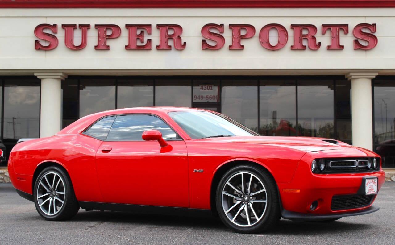 2023 Red Dodge Challenger R/T Plus (2C3CDZBT1PH) with an 5.7L V8 5.7L V8 engine, Manual 6-Speed transmission, located at 4301 NW 39th , Oklahoma City, OK, 73112, (405) 949-5600, 35.512135, -97.598671 - NO DRIVERS LICENCE -NO FULL COVERAGE INSURANCE - NO CREDIT CHECK. COME ON OVER TO SUPERSPORTS, TAKE A LOOK AND TEST DRIVE. PLEASE GIVE US A CALL AT (405) 949-5600. NO LICENCIA DE CONDUCIR - NO SEGURO DE COBERTURA TOTAL - NO VERIFICACION DE CREDITO. VISITENOS EN SUPERSPORTS, MIRE NUESTRO - Photo#0