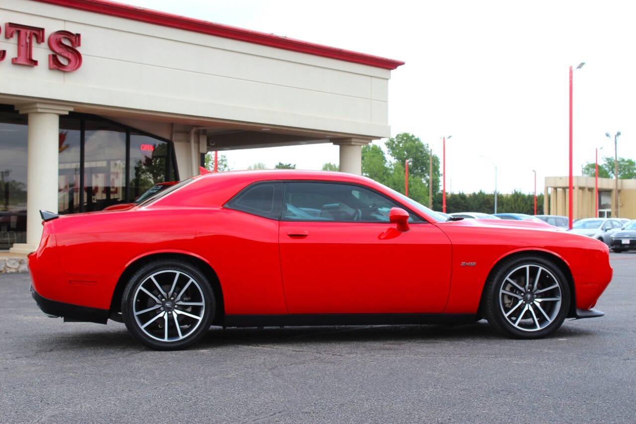 2023 Red Dodge Challenger R/T Plus (2C3CDZBT1PH) with an 5.7L V8 5.7L V8 engine, Manual 6-Speed transmission, located at 4301 NW 39th , Oklahoma City, OK, 73112, (405) 949-5600, 35.512135, -97.598671 - NO DRIVERS LICENCE -NO FULL COVERAGE INSURANCE - NO CREDIT CHECK. COME ON OVER TO SUPERSPORTS, TAKE A LOOK AND TEST DRIVE. PLEASE GIVE US A CALL AT (405) 949-5600. NO LICENCIA DE CONDUCIR - NO SEGURO DE COBERTURA TOTAL - NO VERIFICACION DE CREDITO. VISITENOS EN SUPERSPORTS, MIRE NUESTRO - Photo#1