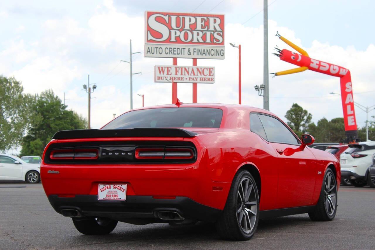 2023 Red Dodge Challenger R/T Plus (2C3CDZBT1PH) with an 5.7L V8 5.7L V8 engine, Manual 6-Speed transmission, located at 4301 NW 39th , Oklahoma City, OK, 73112, (405) 949-5600, 35.512135, -97.598671 - NO DRIVERS LICENCE -NO FULL COVERAGE INSURANCE - NO CREDIT CHECK. COME ON OVER TO SUPERSPORTS, TAKE A LOOK AND TEST DRIVE. PLEASE GIVE US A CALL AT (405) 949-5600. NO LICENCIA DE CONDUCIR - NO SEGURO DE COBERTURA TOTAL - NO VERIFICACION DE CREDITO. VISITENOS EN SUPERSPORTS, MIRE NUESTRO - Photo#2