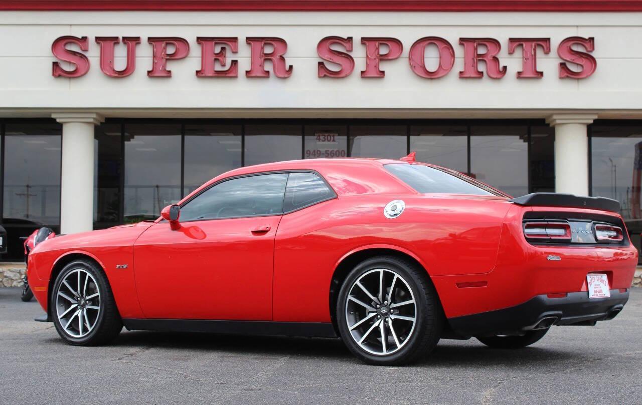 2023 Red Dodge Challenger R/T Plus (2C3CDZBT1PH) with an 5.7L V8 5.7L V8 engine, Manual 6-Speed transmission, located at 4301 NW 39th , Oklahoma City, OK, 73112, (405) 949-5600, 35.512135, -97.598671 - NO DRIVERS LICENCE -NO FULL COVERAGE INSURANCE - NO CREDIT CHECK. COME ON OVER TO SUPERSPORTS, TAKE A LOOK AND TEST DRIVE. PLEASE GIVE US A CALL AT (405) 949-5600. NO LICENCIA DE CONDUCIR - NO SEGURO DE COBERTURA TOTAL - NO VERIFICACION DE CREDITO. VISITENOS EN SUPERSPORTS, MIRE NUESTRO - Photo#3