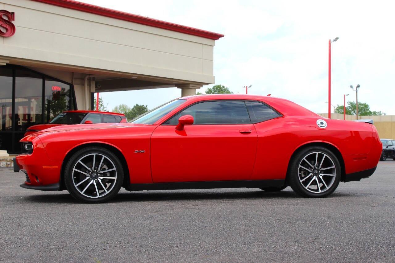 2023 Red Dodge Challenger R/T Plus (2C3CDZBT1PH) with an 5.7L V8 5.7L V8 engine, Manual 6-Speed transmission, located at 4301 NW 39th , Oklahoma City, OK, 73112, (405) 949-5600, 35.512135, -97.598671 - NO DRIVERS LICENCE -NO FULL COVERAGE INSURANCE - NO CREDIT CHECK. COME ON OVER TO SUPERSPORTS, TAKE A LOOK AND TEST DRIVE. PLEASE GIVE US A CALL AT (405) 949-5600. NO LICENCIA DE CONDUCIR - NO SEGURO DE COBERTURA TOTAL - NO VERIFICACION DE CREDITO. VISITENOS EN SUPERSPORTS, MIRE NUESTRO - Photo#4