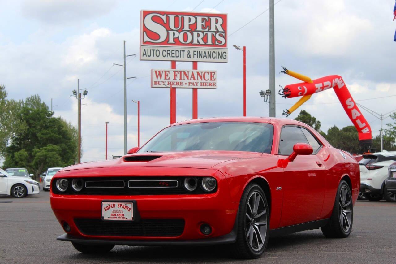 2023 Red Dodge Challenger R/T Plus (2C3CDZBT1PH) with an 5.7L V8 5.7L V8 engine, Manual 6-Speed transmission, located at 4301 NW 39th , Oklahoma City, OK, 73112, (405) 949-5600, 35.512135, -97.598671 - NO DRIVERS LICENCE -NO FULL COVERAGE INSURANCE - NO CREDIT CHECK. COME ON OVER TO SUPERSPORTS, TAKE A LOOK AND TEST DRIVE. PLEASE GIVE US A CALL AT (405) 949-5600. NO LICENCIA DE CONDUCIR - NO SEGURO DE COBERTURA TOTAL - NO VERIFICACION DE CREDITO. VISITENOS EN SUPERSPORTS, MIRE NUESTRO - Photo#5