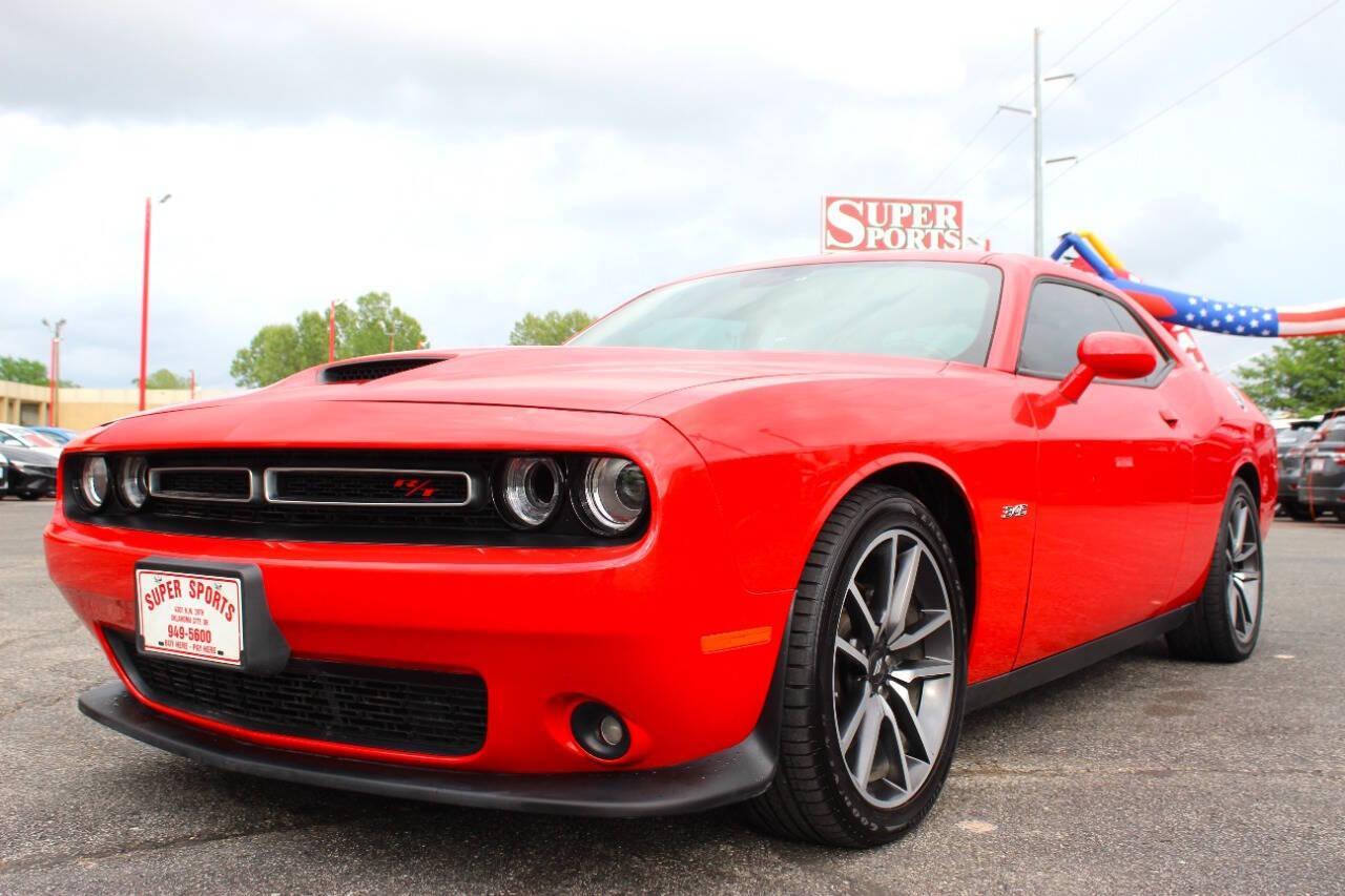 2023 Red Dodge Challenger R/T Plus (2C3CDZBT1PH) with an 5.7L V8 5.7L V8 engine, Manual 6-Speed transmission, located at 4301 NW 39th , Oklahoma City, OK, 73112, (405) 949-5600, 35.512135, -97.598671 - NO DRIVERS LICENCE -NO FULL COVERAGE INSURANCE - NO CREDIT CHECK. COME ON OVER TO SUPERSPORTS, TAKE A LOOK AND TEST DRIVE. PLEASE GIVE US A CALL AT (405) 949-5600. NO LICENCIA DE CONDUCIR - NO SEGURO DE COBERTURA TOTAL - NO VERIFICACION DE CREDITO. VISITENOS EN SUPERSPORTS, MIRE NUESTRO - Photo#6