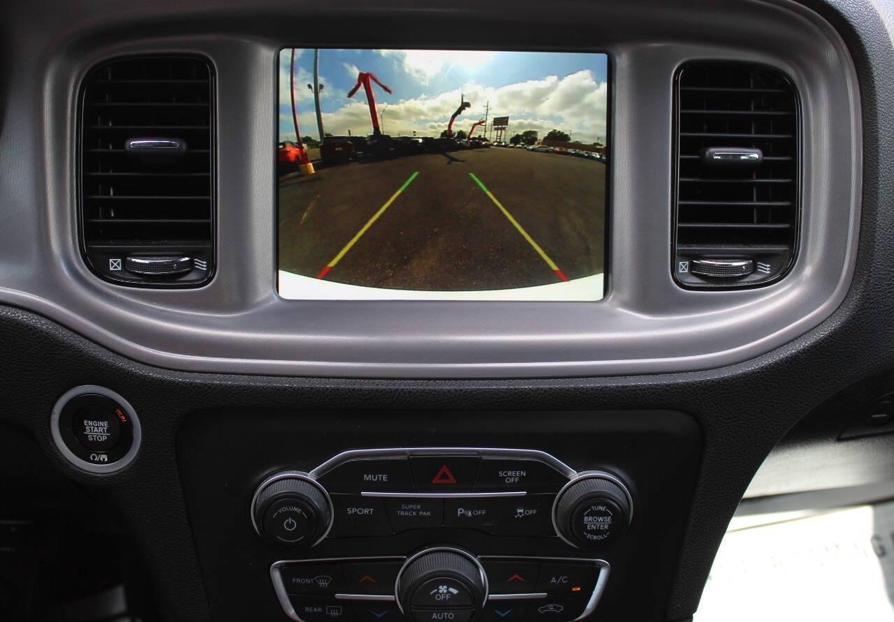 2023 White Dodge Charger R/T (2C3CDXCT4PH) with an HEMI 5.7L V8 370hp 395ft. lbs. 5.7L V8 engine, Automatic 8-Speed transmission, located at 4301 NW 39th , Oklahoma City, OK, 73112, (405) 949-5600, 35.512135, -97.598671 - NO DRIVERS LICENCE -NO FULL COVERAGE INSURANCE - NO CREDIT CHECK. COME ON OVER TO SUPERSPORTS, TAKE A LOOK AND TEST DRIVE. PLEASE GIVE US A CALL AT (405) 949-5600. NO LICENCIA DE CONDUCIR - NO SEGURO DE COBERTURA TOTAL - NO VERIFICACION DE CREDITO. VISITENOS EN SUPERSPORTS, MIRE NUESTRO - Photo#25