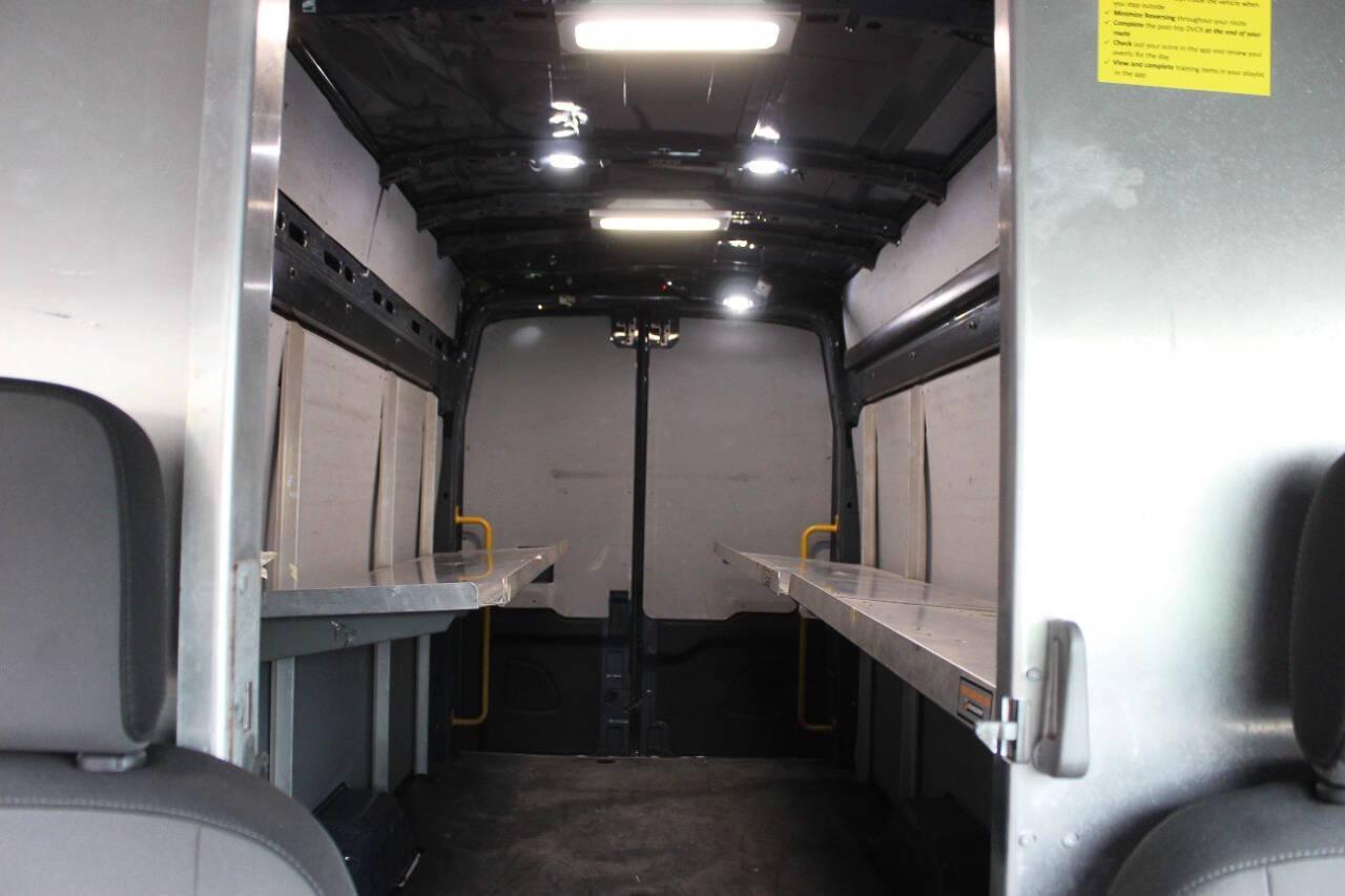 2021 Gray Ford Transit 250 Van High Roof w/Sliding Pass. 148-in. WB EL (1FTBR3X89MK) with an 3.5L Flex Fuel V6 275hp 262ft. lbs. 3.5L V6 engine, Automatic 10-Speed transmission, located at 4301 NW 39th , Oklahoma City, OK, 73112, (405) 949-5600, 35.512135, -97.598671 - NO DRIVERS LICENCE -NO FULL COVERAGE INSURANCE - NO CREDIT CHECK. COME ON OVER TO SUPERSPORTS, TAKE A LOOK AND TEST DRIVE. PLEASE GIVE US A CALL AT (405) 949-5600. NO LICENCIA DE CONDUCIR - NO SEGURO DE COBERTURA TOTAL - NO VERIFICACION DE CREDITO. VISITENOS EN SUPERSPORTS, - Photo#14